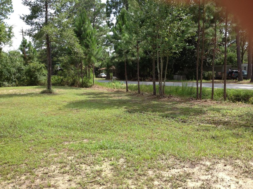 Three prime beautiful lots which are located together with 150' frontage on 393. Property consists of ( 3 ) lots of 50X125. Buy all at 120,000.00 or separate at 40,000.00 each. This property is located in the small historic Town Of Santa Rosa.These lots are very close to and within walking distant of Hogtown Bayou and Cessna Park Landing. Cessna Park Landing comes complete with Boat Launch, Basketball Courts, Picnic Tables, a pavilion with restrooms and Bar-b-que grills.These lots are also located close to Sacred Heart Hospital, Restaurants, Shopping and the beautiful beaches of South Walton. Buyers to do own due diligence to building and dimensions. Offers are welcome