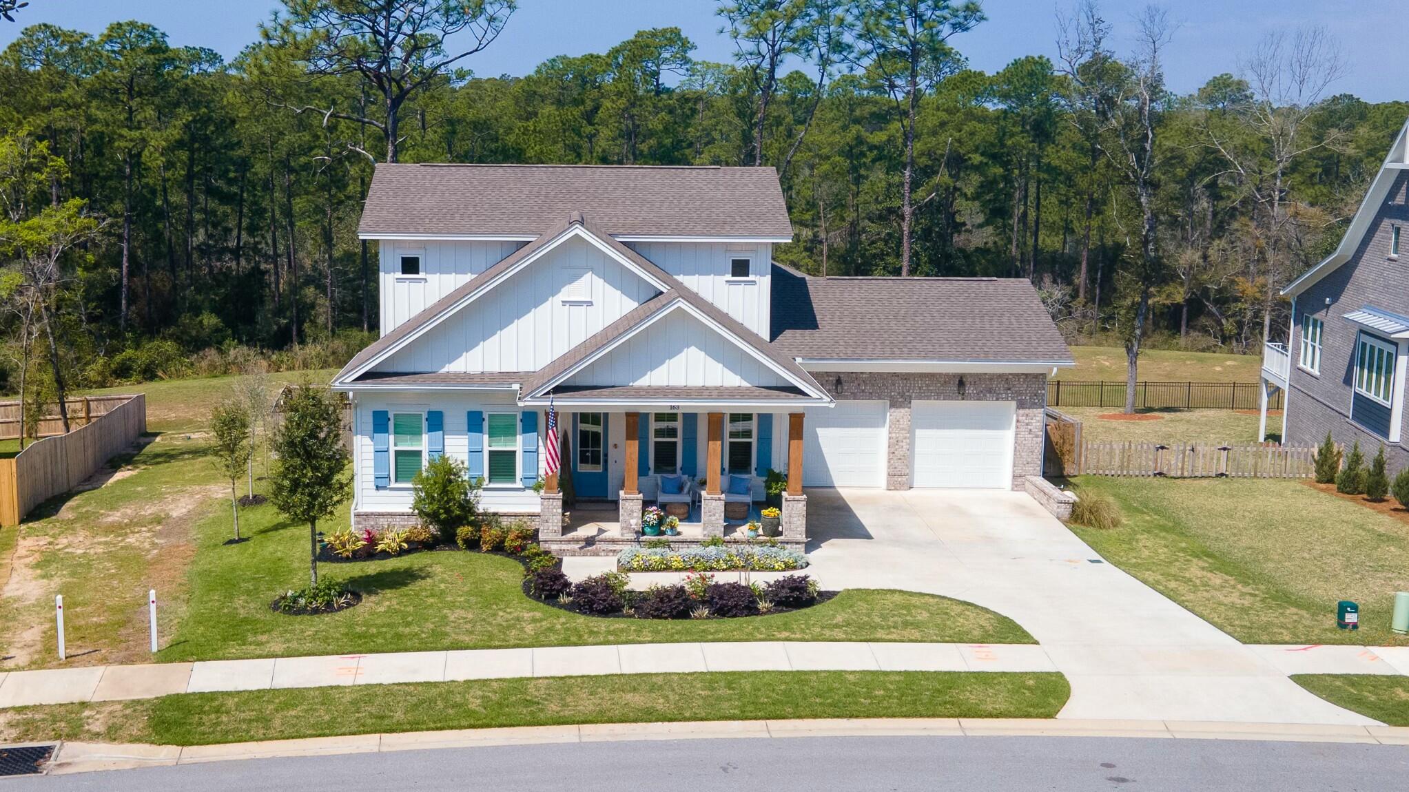 Welcome to this meticulously designed 2-story luxury home, where elegance meets comfort in the heart of Deer Moss Creek. Boasting an array of high-end features and superior craftsmanship. You're greeted by hardwood floors that flow seamlessly throughout the entire home.  The open and airy concept creates a welcoming atmosphere, with high ceilings and an abundance of natural light enhancing every room.The luxury chandeliers add a touch of sophistication and the spacious master bedroom, located on the first floor, features an en-suite bath, offering ultimate privacy and comfort. The heart of the home is the stunning kitchen, creating a perfect space for both casual and gourmet dining. The wall-to-ceiling shelves and crown detailing on the cabinets adds a refined touch. Additional upgrades of the home include plantation shutters, a fully upgraded HVAC system for year-round comfort, and a Rinnai tankless water heater.  The home also features a bonus room and office space, ideal for remote work or personal projects.
Step outside to enjoy the beautiful porch and patio, where you can relax and take in private views of nature. Whether you're entertaining guests or simply enjoying a peaceful evening, this outdoor space is the perfect backdrop for all occasions.
Located in the sought-after Deer Moss Creek, this home offers the perfect combination of tranquility and convenience. With its prime location, this property provides easy access to shopping, dining, and top-rated schools while still offering a peaceful retreat in nature.