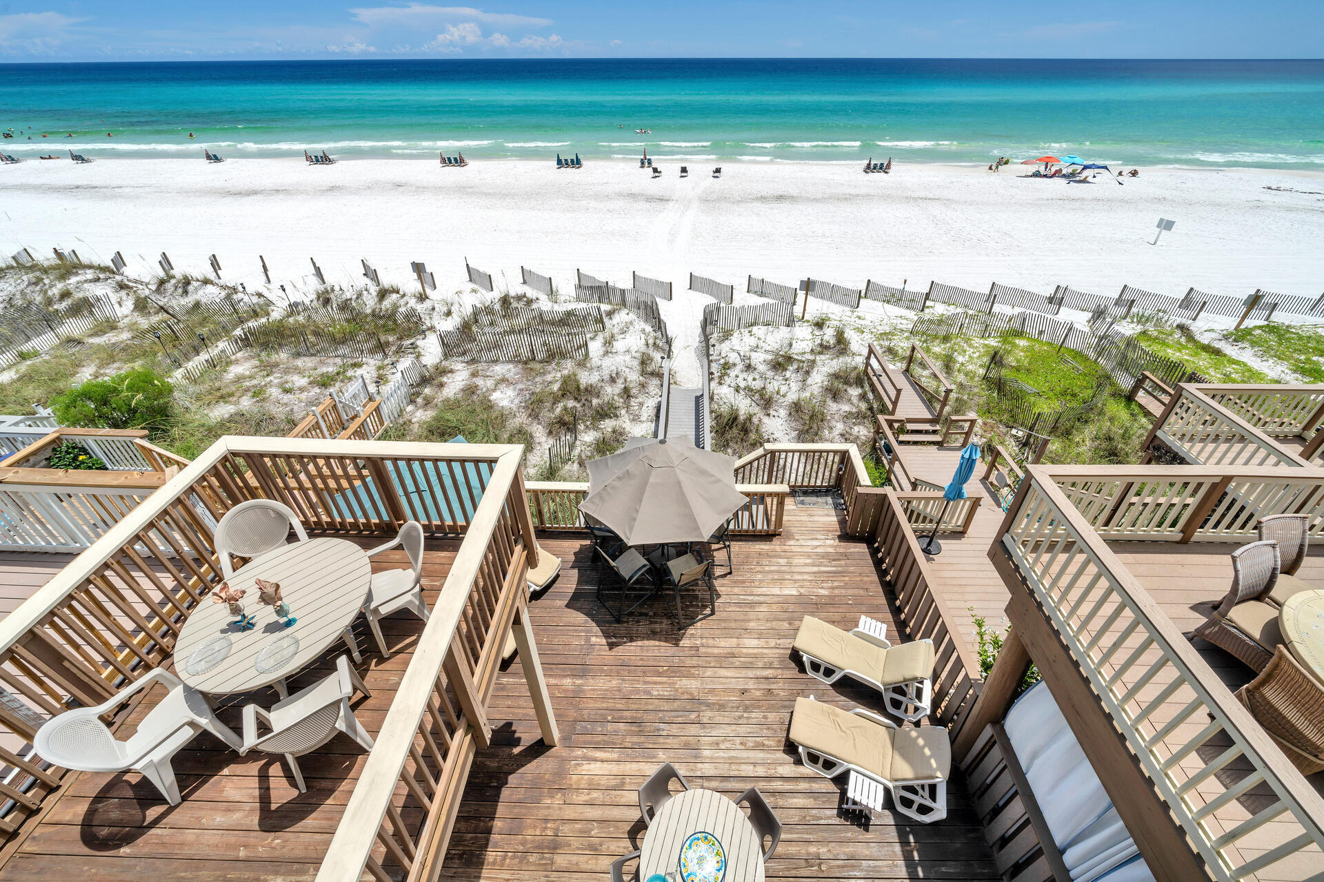 GULF FRONT HOME w/PRIVATE BEACH & 7 DAYS/WK SECURITY GUARD. As opposed to 'beach access', this large END UNIT Townhome includes 35 ft of exclusive, private beach for ONLY owners & their guests. Prime location in complex on Western end AWAY from units 1-5 which are NEAR Terra Cotta's & Enclaves public beach access.What sets this unit aside from other Gulf front townhomes is, it's interior is EXTRA WIDE at 22 ft versus 15 ft, IT'S END UNIT W/10 EXTRA ADD'L FT OF DECKING & BEACH & OFFERS 2 HOMES CONNECTED & also w/separate entrances: a 3 BR/2.5 BA main home PLUS a 2 BR/1BA apart w/living, dining, full kitchen & 10 ft ceilings, use 1 home for yourself & rent the other, or rent both together or separately! A GIANT 35x21 deck adjoins your private beach. Offering stunning Gulf views from