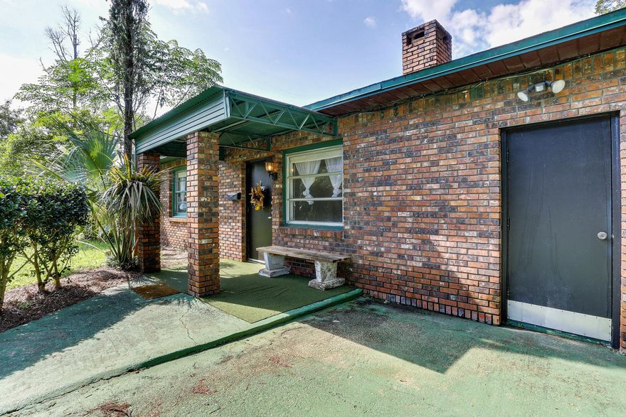 PRICE IMPROVEMENT! A beautiful little investment gem stowed away in a prime location in Niceville! This Florida cottage is situated in its own idyllic garden featuring many different fruit trees (Kumquat,Figs, Lemon), flowers, and a little water feature. The home has a large, enclosed bonus room in the back with windows all around to enjoy the beauty of the garden. There is a brick/wood burning fireplace in the front room, and a bathroom with new flooring and a new vanity! HVAC was just replaced in 2017 and there are two AC handlers! The garage is enclosed and has the potential to become an additional bedroom! Large shed conveys with sale. Don't miss out on this opportunity and the potential of this home!