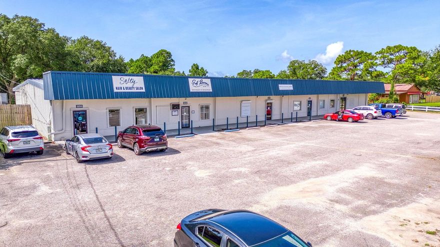 Positioned for success along one of Gulf Breeze's highest value trade corridors, this 2.94-acre property offers a rare investment opportunity with 306 feet of prime frontage on Highway 98--boasting a traffic count exceeding 40,000 CPD. Located in a rapidly growing and highly competitive market, this asset delivers exceptional visibility and access in a thriving commercial district. The 12,048 SF mixed-use building is owner-occupied, offering a clear value-add opportunity for investors to bring lease rates up to market, where NNN rents currently range from $17 to $29 PSF. With demand for quality space outpacing supply, this property is ideally positioned to deliver long-term growth and solid returns. With the addition of a 0.97-acre adjoining parcel, the total site now spans 2.94 acres of HCD-zoned land offering 306 feet of prime frontage along Gulf Breeze Parkway (Hwy 98) and a depth of 443 feet. This exceptional property is strategically positioned in one of the fastest-growing areas of Santa Rosa County, surrounded by robust residential growth, national retailers, and major infrastructure investments.

Property Highlights:

Adjoining parcel included, bringing the total to 2.94 ACideal for future build-out or pad site addition.

Owner-User or Investor Flexibility

Suits both investment strategies or a hybrid modeluse one portion, lease the rest.

Income Growth Potential: Ideal for repositioning, the property is currently owner-occupied with short-term leases, allowing the buyer to re-tenant and capitalize on Gulf Breeze's rising rental rates ($17-$29/SF NNN)."

Less than 1.5 miles from the future $110M Soundside High School, set to open in 2025 -2026 and expected to serve over 1,800 students.

Close to a $6MM 15-acre future soccer complex funded by Santa Rosa County featuring: NCAA regulation and urban soccer fields, Futsal courts, Concessions, restrooms, parking, playgrounds, and multi-use trails; Phase 1 of construction is currently underway with a projected $6M-$9M investment.

Surrounded by major national retailers including Walmart, Publix, Lowe's, Walgreens, Zaxby's, Starbucks, and moreall within one mile.

Strong market demographics:

5-mile radius population: 31,269

Over 854 businesses employing nearly 6,000 people

$1B+ in total annual sales volume (2024)

Perfect for investors looking to diversify their portfolio or business owners seeking a strategic location with growth potential, this property is currently occupied by tenants. Please refrain from disturbing them and contact the agent for showing arrangements


