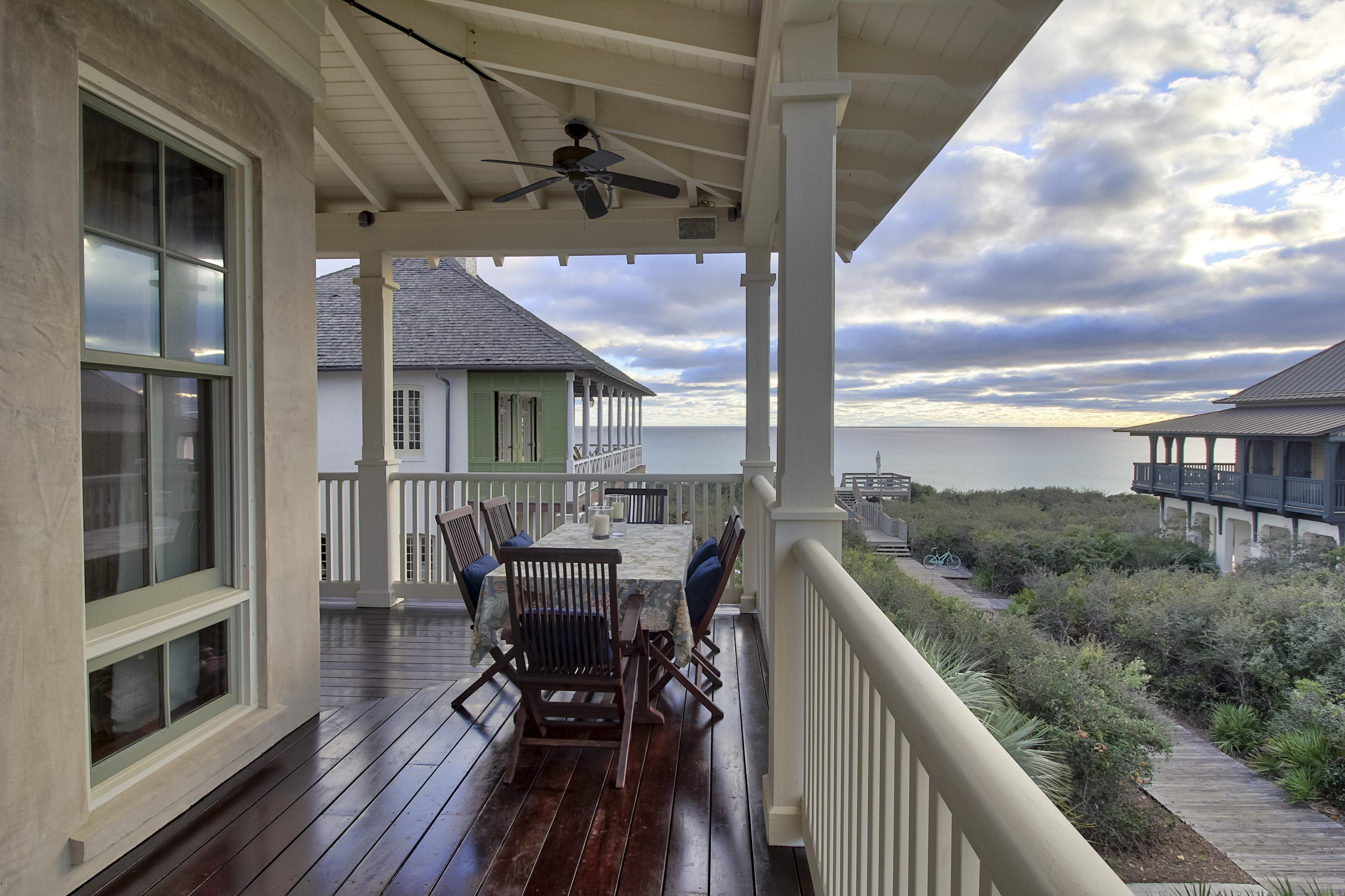 This remarkable home was designed by a talented team of professionals to fulfill the dreams of a family home where memories are made and traditions created. It is specifically crafted to accommodate 16-20 people but perfect for a quiet family get away. The owners insisted on a beach home that took advantage of the beautiful gulf views yet protected the home from stormy weather. This meant having the prime location in Rosemary Beach. GRAND ENTRANCE When you enter the grand foyer with 12 foot ceilings, you have an immediate feeling of quality with no detail left unturned. There are 3 bedrooms located on the first floor, an elevator, laundry room and private back entrance that leads to the outdoor shower and charming courtyard. The beautifully styled master suite presents 12 foot