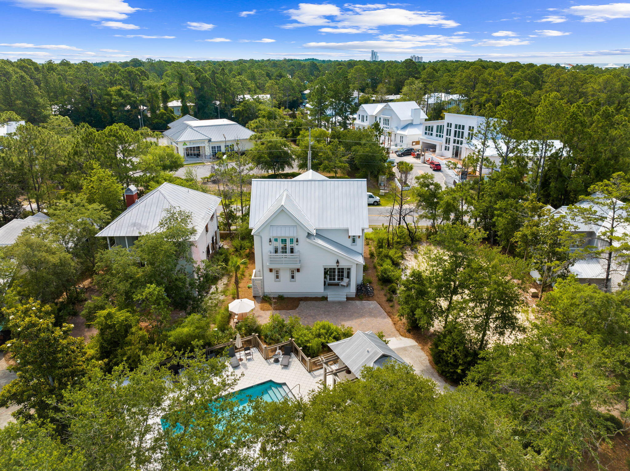 Seller offering 75K in Buyer Concessions. Welcome to The Hammocks of Seagrove; located next to Seaside and Watercolor. This exclusive community offers the perfect location with easy walkability access to the beach, and close proximity to world class amenities, dining, and entertainment options. Step inside this newly built coastal haven which has been well appointed by a top local designer and well planned with 3100 square feet of living space: offering 4 bedrooms & 3.5 bathrooms. Upon entering, you will be greeted by an airy, open concept living space adorned with custom finishes, coastal hues and abundant natural light