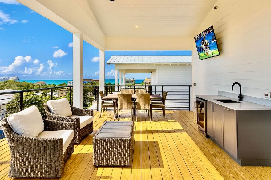 Brand new, just completed...Gorgeous four-story rental dream, south of 30A on Mary Street in Blue Mountain Beach. Perfect for indoor and outdoor entertaining with less than a 5 minute walk to the beach, the house features rental income projections of around $235,000.  Designed with vacation in mind, the first level includes a half bath and mini kitchen with a full sliding wall that opens to the pool deck. The second floor features the spacious kitchen, dining and living area, perfect for large families or parties to gather. The kitchen features Thermador appliances, a gas stove, ample counter space for serving, and a walk-in pantry. The third floor boasts a lovely master suite with a private balcony.