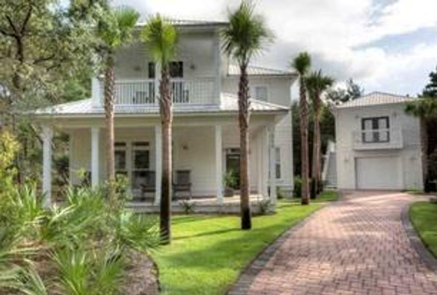 PRIVACY, privacy, and more privacy on 30A! NO HOA. Open floor plan, LARGE lot w/ room for future pool, and detached garage w/ fully equipped Carriage House above. Main house boasts beautiful wire-brushed hardwood floors, screened in back porch w/ BBQ, private balcony off 2nd floor bedroom, and private access to 1st floor master. This home is a perfect rental, 2nd home, or owner occupied. 2 master bedrooms- 1 up and 1 down each w/ its own en suite bath.The beautiful brick driveway leading back to the home, lush green yard w/ well-serviced sprinkler system, and wooded area that extends beyond all offer added privacy to this owner designed home. Full of pristine upgrades, this home just across 30A from the Emerald waters of the gulf make this a MUST see!