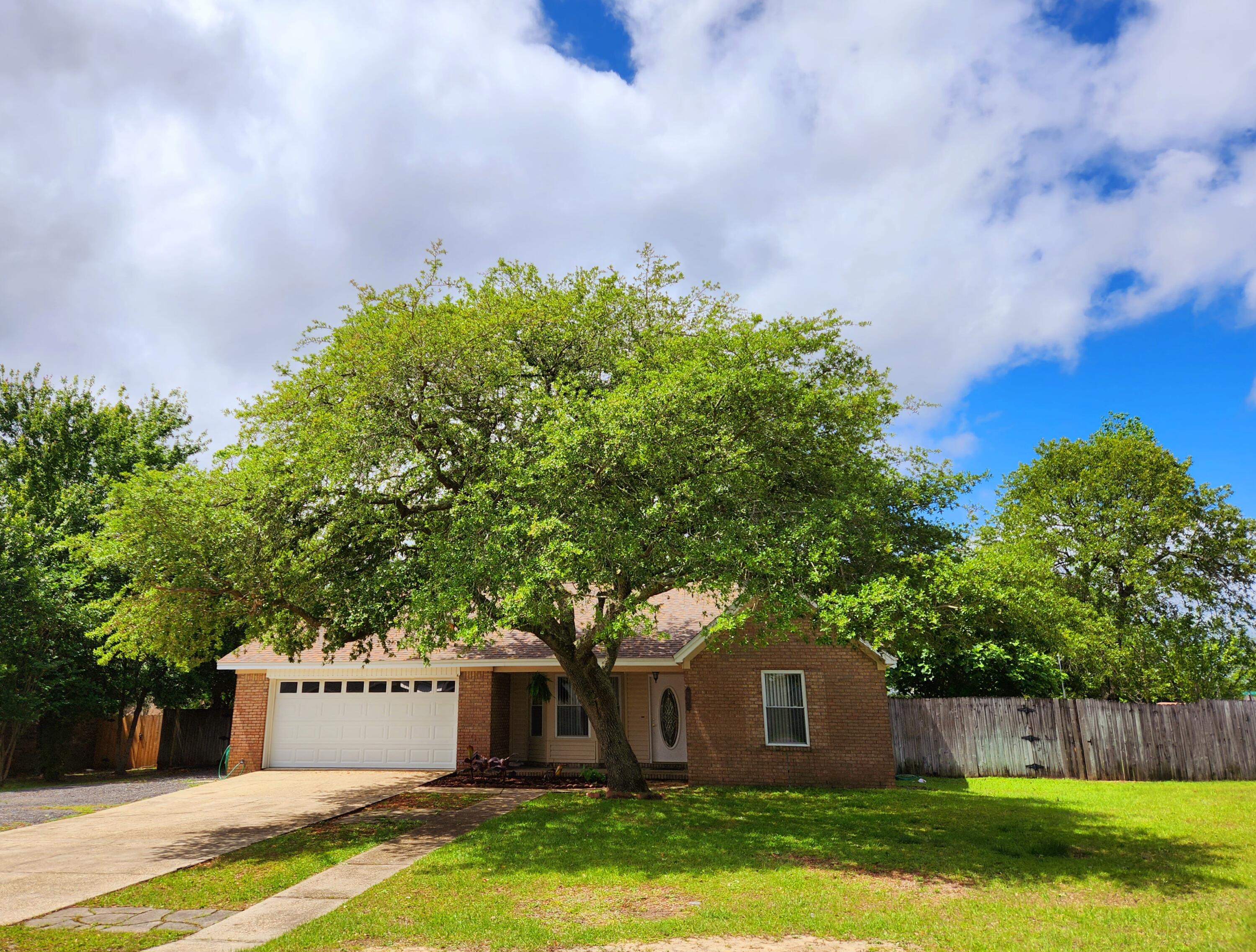 Awesome location south of 1-10 this brick 3/2 with 2nd living area and screened porch is convenient to Duke, Eglin & Hurlburt Field. Looking for a renovated home? This is it, Split bedroom situated on larger corner lot. Home features new roof, HVAC, hot water heater, electric panel, cabinets, granite, vanity & granite in master bath, tub in hall bath, garage door and opener, lighting. Beautiful mature trees & plenty of shade. Double gate in the rear, so easy access if you need to store boat, RV or trailer. Sprinkler system conveys as is.
