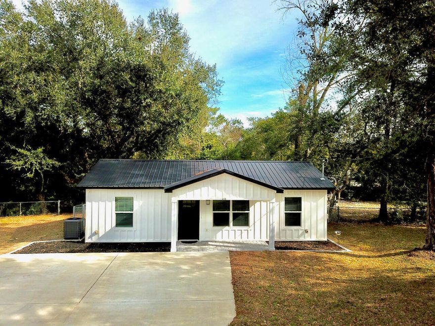 Completely rebuilt in 2023, this beautifully updated home at 312 US Highway 331 N., DeFuniak Springs offers modern finishes and move-in-ready convenience. The home features a well-appointed kitchen with stainless steel appliances and pull-out shelving in the cabinets, providing both style and functionality. The property is being sold fully furnished, making it an excellent option for a primary residence, second home, or investment opportunity. Outdoor living is a highlight with a large brick paver patio in the backyard, complete with outdoor furniture and a grill, ideal for entertaining or relaxing. Two additional storage sheds are located in the backyard, offering ample space for tools, equipment, or hobbies. With recent reconstruction, included furnishings, and outdoor amenities, this property delivers exceptional value and low-maintenance living in DeFuniak Springs.