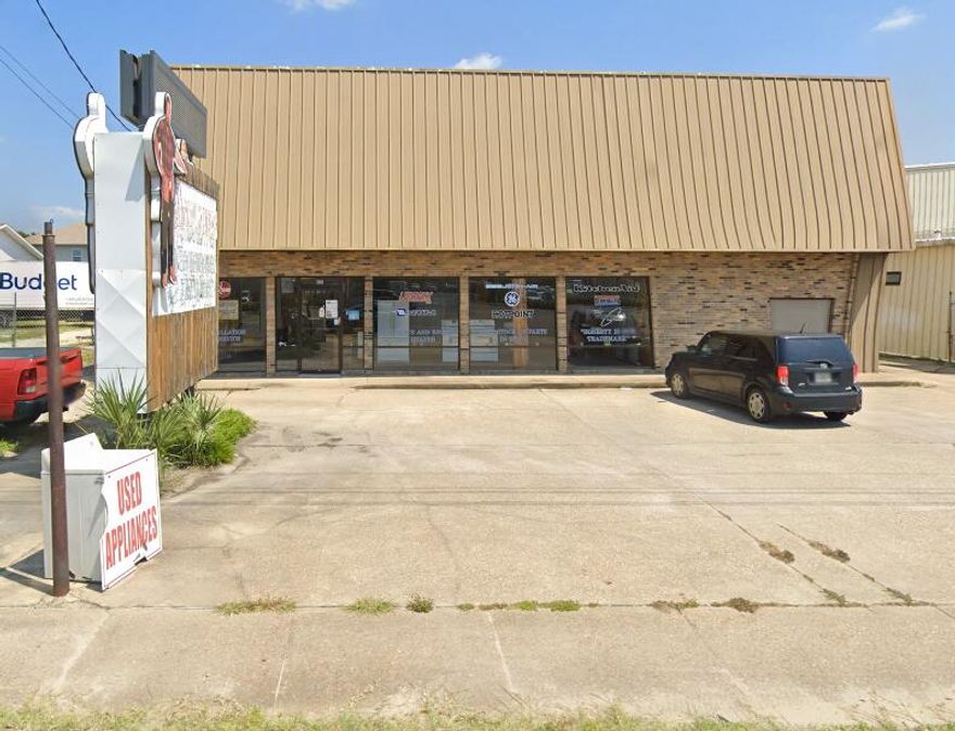 This is a great commercial/retail location! Located directly on Racetrack Road, the North side of Fort Walton Beach, Florida. It has outstanding visibility and easy access with large parking areas. The previous tenant was an air conditioning and appliance company with a retail storefront in addition to providing HVAC services.A nice canopy across the front covers the doors and windows. A service/shop area is located at the rear of the building with a second floor for lots of storage with a cargo lift (not for personnel) to assist in moving heavy loads upstairs and to bring them down. There is a large roll-up door in the rear area as well, so there's easy access. There is a bathroom upstairs and one downstairs, plus an Office upstairs that is fully heated and cooled.