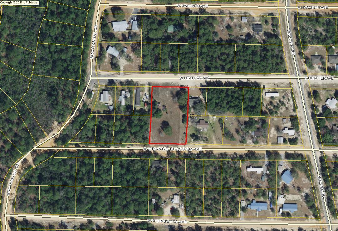 2 level and cleared lots with older metal building, septic and water tap, not guaranteed.