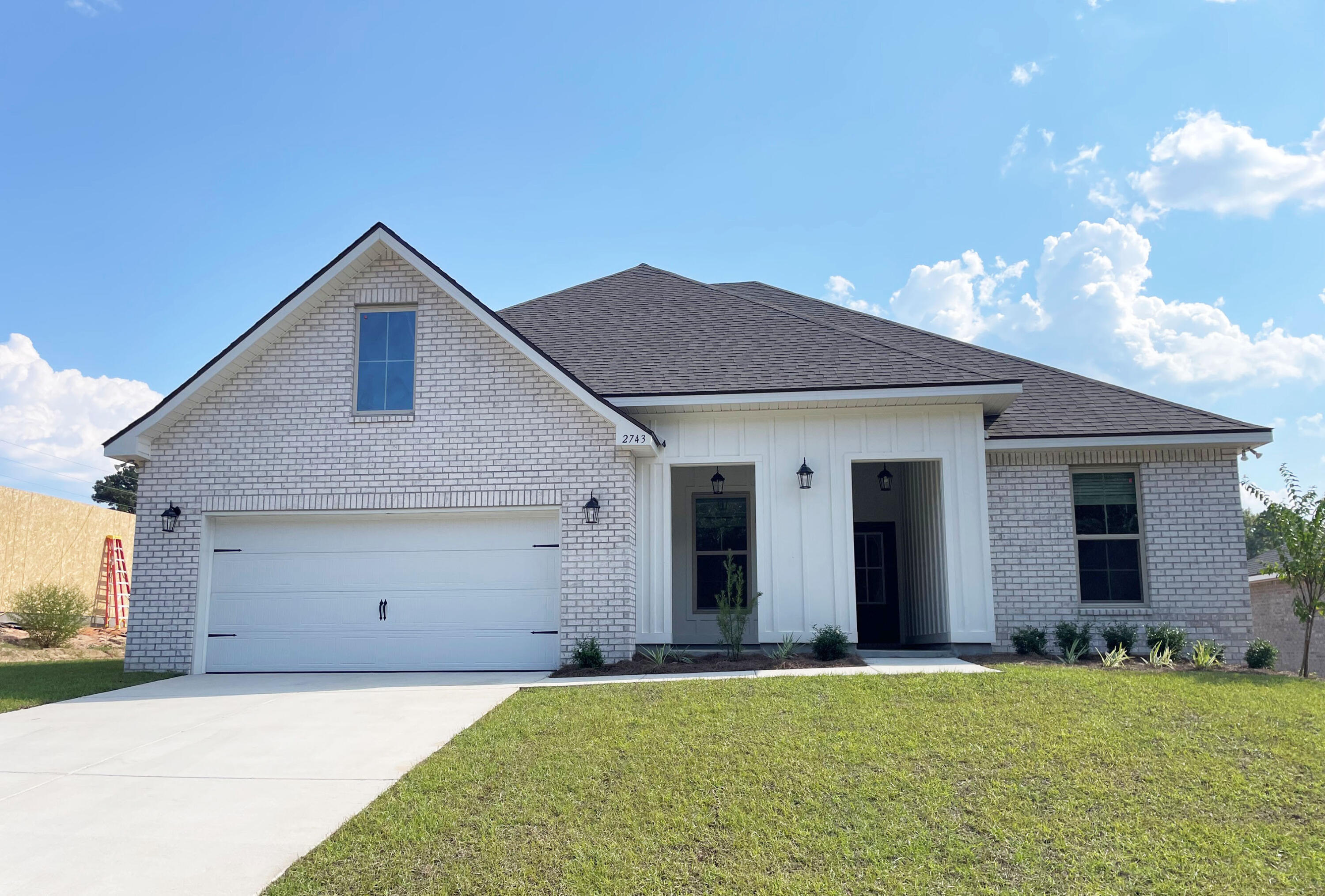 Awesome builder rate plus FREE front gutters. Restrictions apply.The HICKORY III G in Young Oaks community offers a 5 bedroom, 3 full bathroom, open design with formal dining room and separate den. Upgrades added (list attached).Features: double vanity, garden tub, separate shower, and walk-in closet in master bath, kitchen island, walk-in pantry, boot bench at garage entry, covered porches, crown molding, recessed lighting, ceiling fans, framed mirrors, smoke/carbon monoxide detectors, landscaping, architectural 30-year shingles, flood lights, and more! Energy Efficient Features: water heater, kitchen appliance package with a electric range, vinyl low E MI windows, and more! Energy Star Partner.