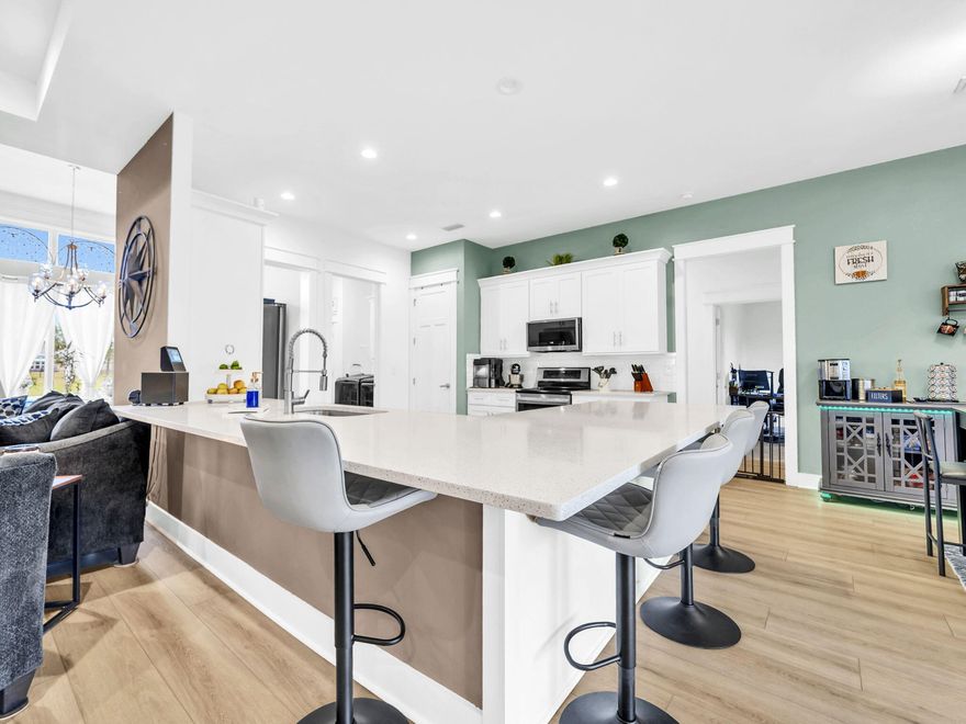 3.5% assumable mortgage available! Welcome to 440 Gentle Wind Court--an exceptional 2,641 sq. ft. home custom-built by Windswept Dream Homes, offering timeless craftsmanship and modern comfort. Situated on a beautifully landscaped .64-acre lot in the gated Windswept Estates, this residence combines high-quality construction, stylish finishes, and expansive outdoor space for a truly elevated living experience. Open-concept layout with 3 spacious bedrooms, 2 baths, formal dining, and a bonus room/home theater (285 sq. ft.)--perfect for movie nights, office, or a fourth bedroom. Brand new luxury vinyl plank flooring throughout main living areas--stylish, durable, and low-maintenance. Kitchen features custom cabinetry, stainless-steel appliances, and a massive quartz island that's built for entertainment. New stainless-steel refrigerator and microwave (2025)sleek, efficient, and ready for your next dinner party. Spa-inspired primary suite with an oversized tiled shower and a huge walk-in closet that feels like a boutique. Engineered with premium materials for peace of mind: 5/8" rebar foundation, 3000 psi concrete, 2x6 exterior walls, Hurricane straps, hangers, and all-thread reinforcements. Oversized 2-car garage plus attic storage for all your gear, hobbies, and holiday d??cor. Outside, you will find a Jacuzzi spa for ultimate relaxationyour personal retreat after a long day. Complete sprinkler system with a new pump (2025)keeping your lawn lush and green with zero hassle. Expansive backyard with endless potential: garden, pool, outdoor kitchenyou name it. Just 5 miles to the new Publix shopping center in Freeport. Only 35 minutes to Blue Mountain Beach and Scenic Highway 30A. This move-in-ready home offers a rare opportunity to enjoy high-quality construction, modern comfort, and a peaceful settingall within reach of the Emerald Coast.
