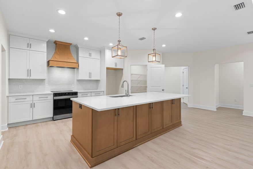 BRAND NEW craftsman style home you will fall in love with! Located on a 1/2 ACRE lot, there is plenty of room to create the BACKYARD space of your dreams with a pool, outdoor kitchen, or just enjoy the WOODED private backyard as it is! This 5-bedrm, 3-bathrm, 3-car garage home has all of the CUSTOM home upgrades that you have been looking for: BRICK exterior with 2X6 construction, TALL ceilings, 8' entry door, oversized front windows, and a 26' rear covered PATIO. Inside boasts LVT flooring (no carpet), custom all-wood CEILING height cabinetry w/ soft-close hinges, WOOD HOOD range vent cabinet with blower, tile backsplash, large kitchen ISLAND w/ double cabinetry, QUARTZ counters, MICROWAVE DRAWER, slide-in range, walk-in pantry, MUDROOM, and a laundry room with added FREEZER space! Other features include: recessed lighting throughout interior and exterior, coat closet, trey ceilings in living room and master bedroom, ceilings fans in all bedrooms and on back patio, jack and jill bathroom with double vanity and private water closet, 3rd full bathroom with back patio access, oversized closets with lighting, 2 walk-in closets in master suite, tiled walk-in shower with glass doors, private water closet, double vanity, linen closet, floating shelving, and an oversized window.