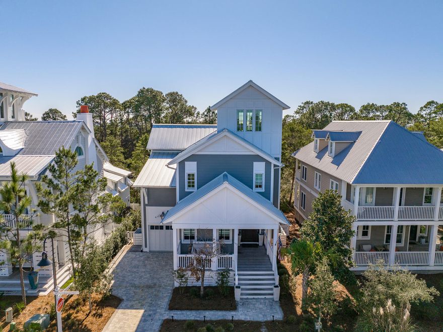Designed By Margaretten Architectural and built by a highly regarded local builder for his family, this home makes the dream come true for anyone wanting to live within easy walking distance to the beautiful beaches of 30A via the neighborhood's deeded beach access.  Vaulted bedroom ceilings with beams and shiplap throughout the living area displays rustic quality.  Wide plank engineered hardwood floors throughout the home continues with the appeal of cozy solidarity.  30'' deep kitchen Marquis cabinets paired with quartz countertops plus the highest luxury appliances create the most wonderful place to cook for family and friends.  Appliances include a Sub-Zero refrigerator, 48'' Wolf gas range with downdraft range vent, Cove dishwasher, GE Ice-O-Matic nugget ice machine and Wolf microwave