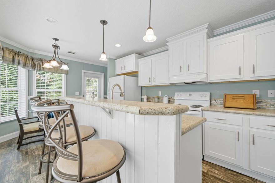 &#127795; Secluded & Spacious Manufactured Home on 1.17 Acres - Move-In Ready!Welcome to your peaceful retreat! This well-maintained, practically new manufactured home sits on a huge 1.17-acre corner lot, mostly wooded for privacy and located on a paved road. Whether you're starting out or downsizing, this property offers the space and serenity you've been searching for.&#10024; Interior Highlights: Open kitchen with a breakfast bar, farmhouse sink, and dedicated dining area Large family room with durable vinyl flooring--perfect for easy maintenance Owner's suite with a spacious bath featuring a garden tub, separate shower, and dual vanities&#127807; Outdoor Potential: Room to roam, garden, or build your dream workshop Keep the natural seclusion or clear some space for expansion