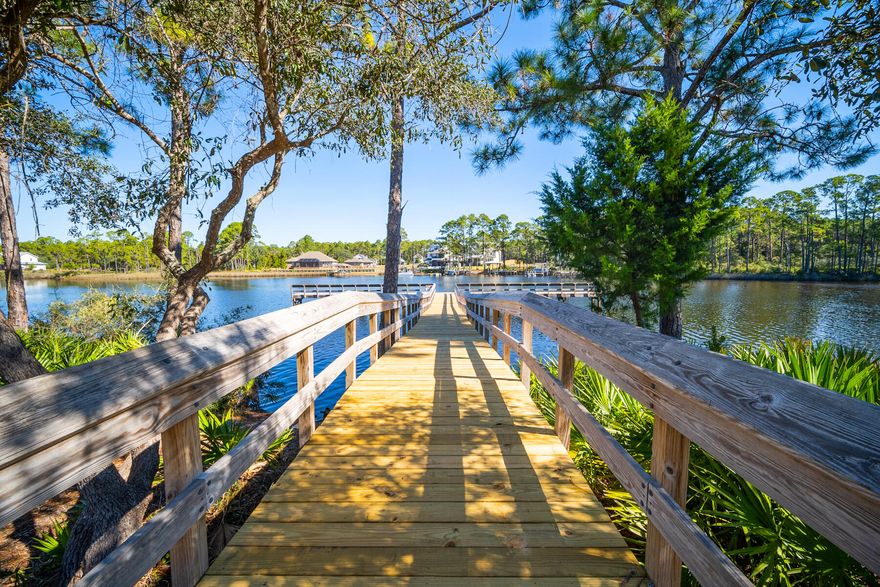 'CURRENTLY UNDER CONTRACT,SELLER WILL CONSIDER BACKUP OFFERS.Turtle Cove is the perfect Dune Lake community.  Located on lovely Lake Powell which is the largest coastal dune lake in not only Florida, but the entire North American continent.  Enjoy paddle boarding, tennis, swimming, kayaking, fishing, and a multitude of other amenities that this quaint community offers.  The swimming pool and clubhouse overlook the lake where you can enjoy the natural NW Florida wildlife and landscape.  This quaint 3/2 home was a custom build by Ben Wortman Construction in 2016.  The original owner still occupies the home.  The open concept design encourages entertaining and gathering with friends and family.  One private bedroom is located upstairs and makes a perfect bunk room for children or private gue