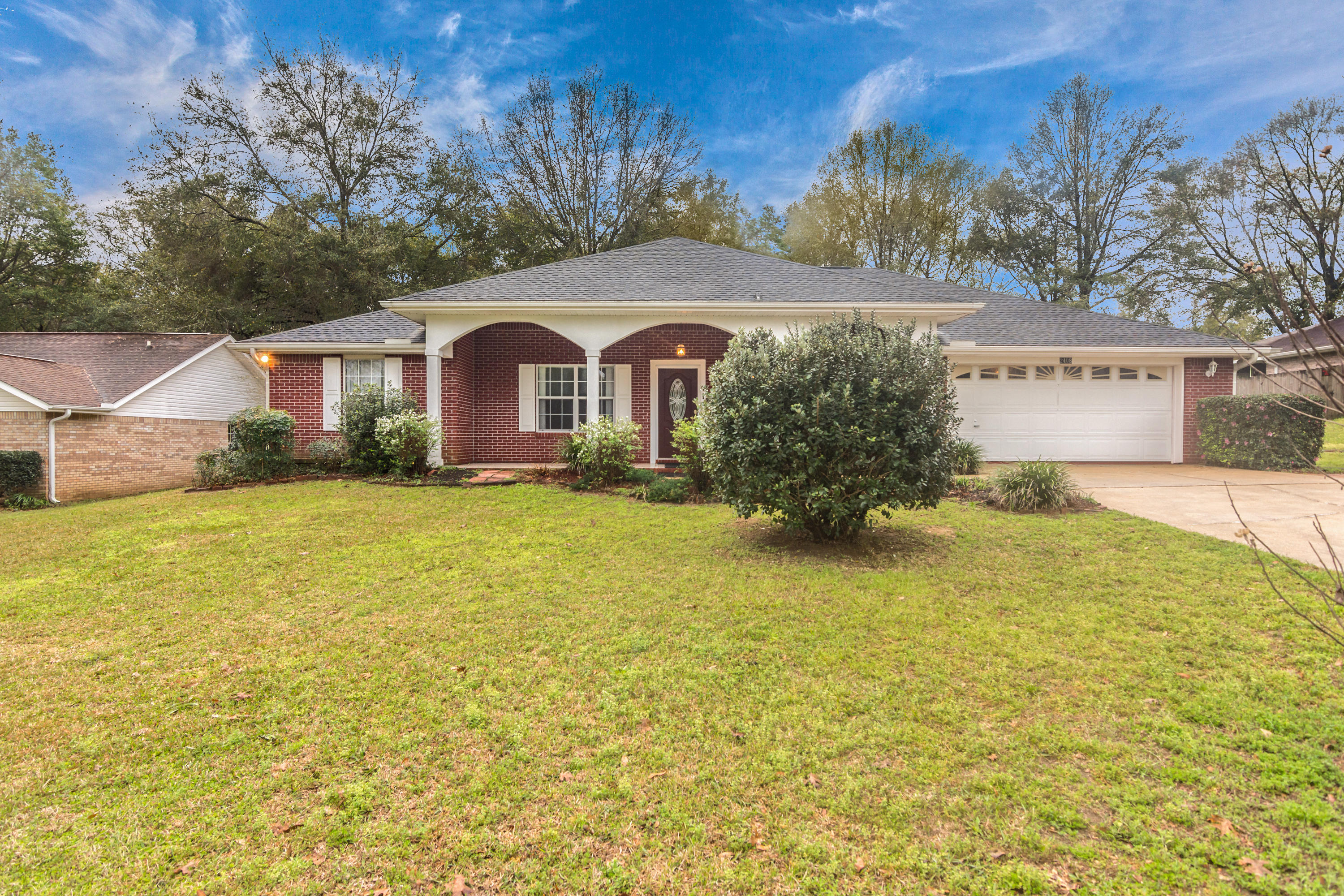 Immaculate 3 bd/2 ba home situated on a large, nice lot in north Crestview. Relax w/ friends over a glass of sweet tea on this welcoming front porch!! Inside you will find a spacious living room w/ columned entry to the dining area. Stunning kitchen features bright white cabinetry, beautiful granite countertops, prep sink and fully equipped with all kitchen appliances (stove/oven, microwave, dishwasher and fridge). Adjacent breakfast nook has double door closets featuring nooks to house your small appliances, desk/prep area, hobby supplies, you name it. The home has a large master suite w/ beautiful tiled shower and stunning vanity. Spacious laundry room with space for a freezer, etc.. The 2 car garage features a canning pantry and the owner is leaving the metal lockers SEE SUPPLEMENT