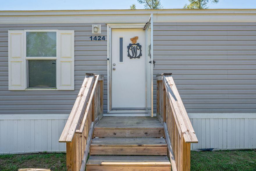 Escape to peaceful country living with this 2023 4BR/2BA manufactured home featuring a new HVAC, water heater, and roof--all the same age as the home. The split floor plan offers privacy with the master suite on one side and 3 bedrooms on the other. Sitting on over 1.5 serene acres with no HOA, it's ideal for those who value the outdoors, space, and privacy--Start a homestead, grow a garden, or add a workshop/barn. With space to spread out, and the opportunity to build your forever home, this quiet parcel is the perfect place to put down roots, and grow at your own pace!10 minutes to Karick Lake & Baker School, ~33 min to Duke Field. Eligible for VA & FHA financing.