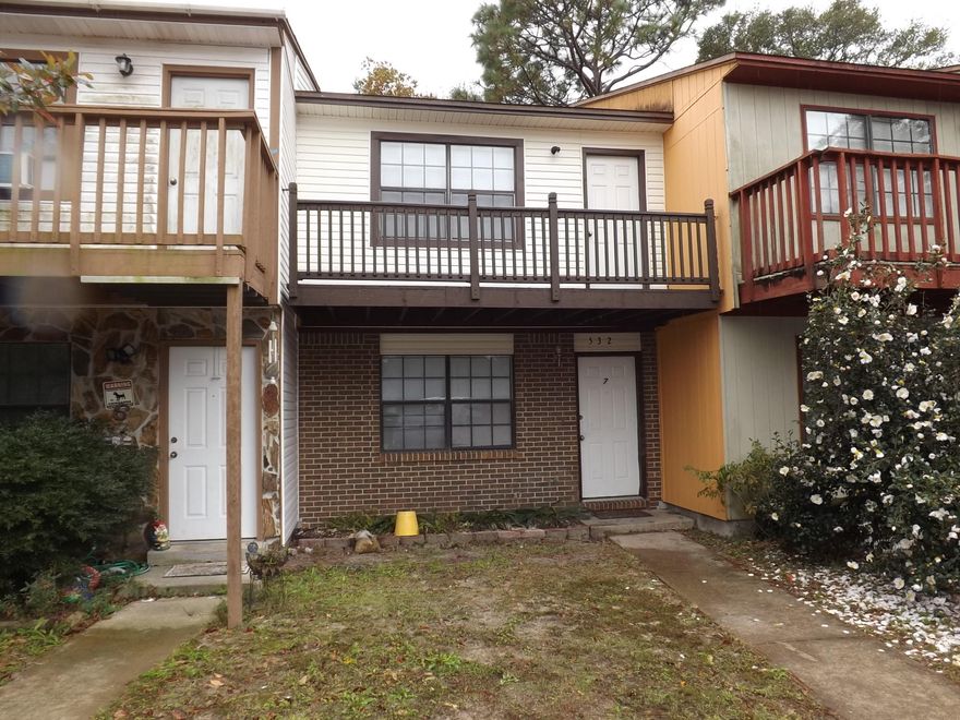 Nice 2 bedroom 2.5 bath townhome in heart of Ft. Walton Beach. Both bedrooms are upstairs and each has its own bath. Half bath downstairs. One bedroom has double vanities in bathroom, large closet and its own door to the front balcony. Kitchen has ample counter and cabinet space, room for dining table and sliding glass door to fenced backyard and utility room where you will find the washer/dryer connections. Upgrades include HVAC system replace in 2003, exterior vinyl siding and tile floors installed 2006, dishwasher installed 12/2014. Close to both Eglin and Hurlburt, convenient to shopping, beaches and in the Kenwood Elementary, Pryor Middle and Choctawhatchee High School districts. Unit has been a rental for many years with excellent history.