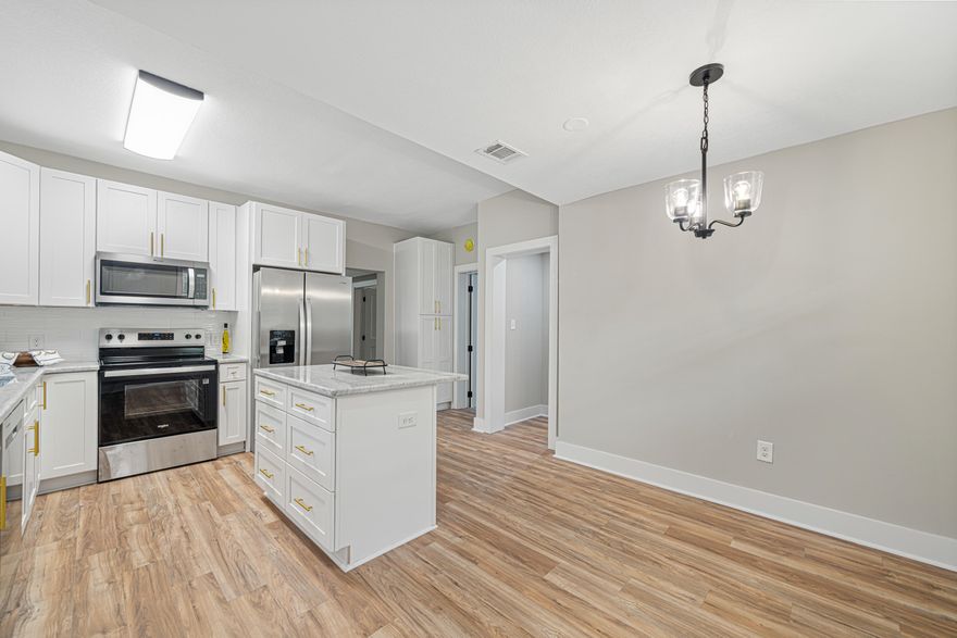 3/2 House and 1/1 Apt..  EFFECTIVE YEAR BUILT HAS BEEN CHANGED TO 2005!!!!!Fully Renovated Home - Move-In Ready! house 3/2 and Apt 1/1 (New Minisplit Unit)  $221k in update's!!This stunning home has been completely updated, featuring brand-new wiring, a new roof 2025, WH 2022, Refurbished HVAC 2013, new mini split in apt. all-new windows for modern comfort and efficiency. Step into a gorgeous new kitchen with a spacious island, granite countertops, and stainless steel appliances, perfect for cooking and entertaining Enjoy freshly textured ceilings and walls, new paint inside and out, and upgraded fans and lighting throughout. The bathrooms have been fully remodeled for a sleek, contemporary feel.Don't miss this beautifully updated home--schedule your viewing today!