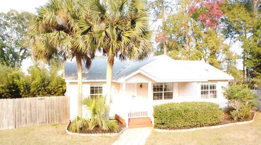 LOCATION, LOCATION, LOCATION! Just 2 miles from the award-winning South Walton Beaches and Dune Lakes, this Santa Rosa Beach gem is perfectly positioned between the Gulf and a nearby bay boat ramp ideal for enjoying all the coastal lifestyle has to offer.This partially furnished 3 bedroom, 2 bathroom home is packed with upgrades, making it a fantastic opportunity for homeowners seeking a stylish and functional property in a prime location.Inside, you'll find elegant mosaic tile accents, large format tile flooring throughout, and a chef-inspired kitchen featuring a center island with prep sink, upgraded granite countertops, soft close hardwood cabinets, and stainless steel appliances including a double oven. The kitchen also boasts a stainless steel subway tile backsplash and more under-cabinet lighting, and a lighted pot rack for added flair.

From the moment you step through the front door, you'll be captivated by the elegant mosaic tile in the foyer and thresholds leading to each bedroom, setting the tone for the attention to detail throughout this 3-bedroom, 2-bathroom home.

The open floor plan enhances the home's livability and flow, making it great for both everyday comfort and entertaining. The master suite offers a spacious walk-in closet with built-in wood shelving and a spa-like bathroom complete with an all-tiled shower, pebble stone flooring, a glass door, and luxury body jets.

From the welcoming mosaic tile foyer to the thoughtful finishes throughout, this home delivers a level of detail rarely seen in this price range.

The chef-inspired kitchen is a standout feature, designed with functionality and luxury in mind. Highlights include:

A center island with a prep sink, garbage disposal, and additional outlets, complemented by a lighted pot rack for both style and convenience.
Upgraded granite countertops with rounded corners for a polished look and a unique cut-in corner for added workspace.
A stainless steel subway tile backsplash paired with under-cabinet lighting to create a sleek and modern ambiance.
Hardwood cabinets with soft-close features, including a glass-door end unit for display.

Don't miss your chance to own a beautifully upgraded home in one of Santa Rosa Beach's most sought-after locations just minutes from both the bay and the beach. Schedule your private showing today!