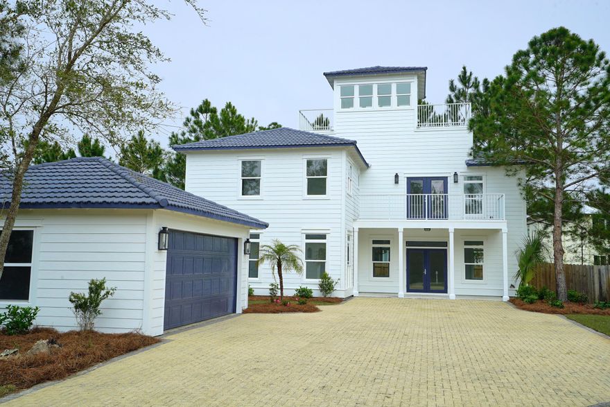 Completely Renovated!!! Gorgeous 4 bedroom, 4.5 bath beach home located just blocks from the gulf and only 3 lots from the amazing community pool. Fenced in backyard. Two car garage. Bedroom on the main with ensuite bath. Floor to ceiling windows cascading in natural light. Massive master bedroom with a private balcony and stunning bath. This property has been totally gutted and refinished from top to bottom. New flooring, cabinets, countertops, appliances, paint, light fixtures, and landscaping throughout the entire home. Will not last long.