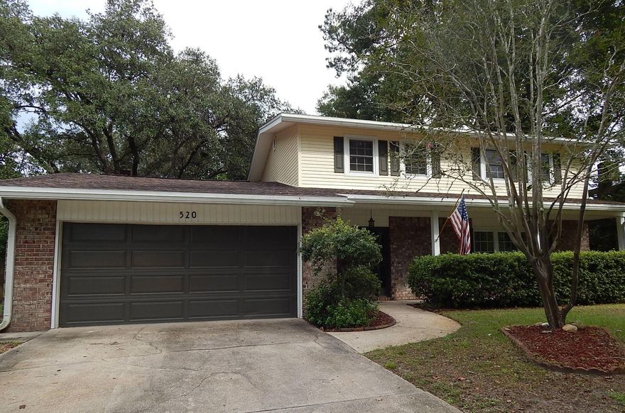 KENWOOD GEM! MOVE-IN-READY! Renovated home Located close to Beaches, Bases, Shopping and Schools! Wonderful floor plans with 3 Bedrooms upstairs. A 4th bedroom was used to enlarge the Master Bath, which is GORGEOUS! There are TWO Living Areas AND a Formal Dining room! There is a half bath downstairs for guests. Home has been updated with wood look laminate flooring downstairs, tile in baths and carpet in bedrooms. The kitchen has a Huge Island, Stainless appliances (including a gas stove!) and newer plumbing fixtures. The walls and ceilings were scraped and textured for a fresh finish! The guest baths have been updated with new vanities and granite. Master bath has a large walk in tiled shower. Large family room has a gas fireplace and custom built-ins just off the kitchen.