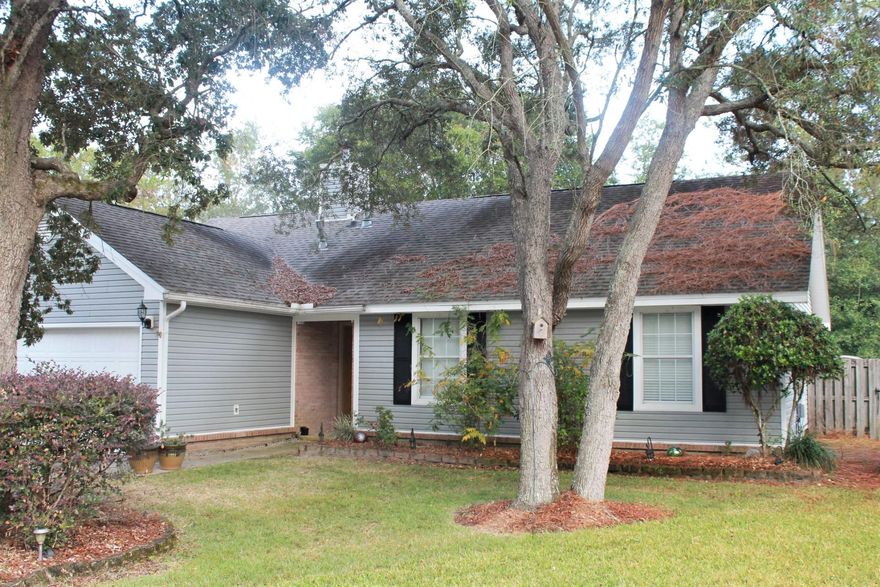 Updated and Move-In Ready 4 bedroom/2 bath home located in Bluewater Bay. This beautiful home is within close walking distance to the Bluewater Bay Elementary School. You are also centrally located to shopping, golf and the beautiful beaches of Destin. As you enter the home, the main living area is accented with a cathedral ceiling, laminate floors and a gas fireplace. The updated kitchen has stainless appliances, corian countertops and updated cabinets. Custom french doors lead you to the nice sized backyard with privacy fence. There is also a large bedroom/bonus room upstairs. There is lots of storage under the stairs and there are pull down stairs in the garage. Transferable termite in place. The Homeowners Association dues they care of the front yard lawn and shrub maintenance.