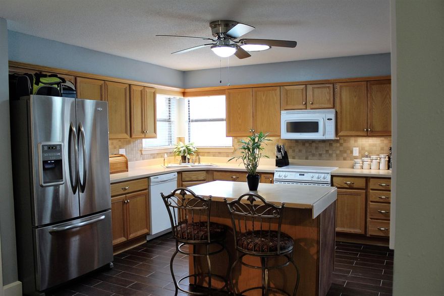 *HOME WARRANTY!* Located only 3 miles from Hurlburt, this fully renovated home features beautiful ''wood look'' tile floors throughout, Corian countertops, crown molding, vaulted ceiling, tongue-in-groove accent wall in the living room with a wood burning fireplace, screen room, hot-tub, and a private pool. On one of the largest lots in Timberlake Estates, the property has plenty of room for RV or boat parking and backs up to Eglin's Reservation for extra privacy and fun. Buyer to verify measurements.