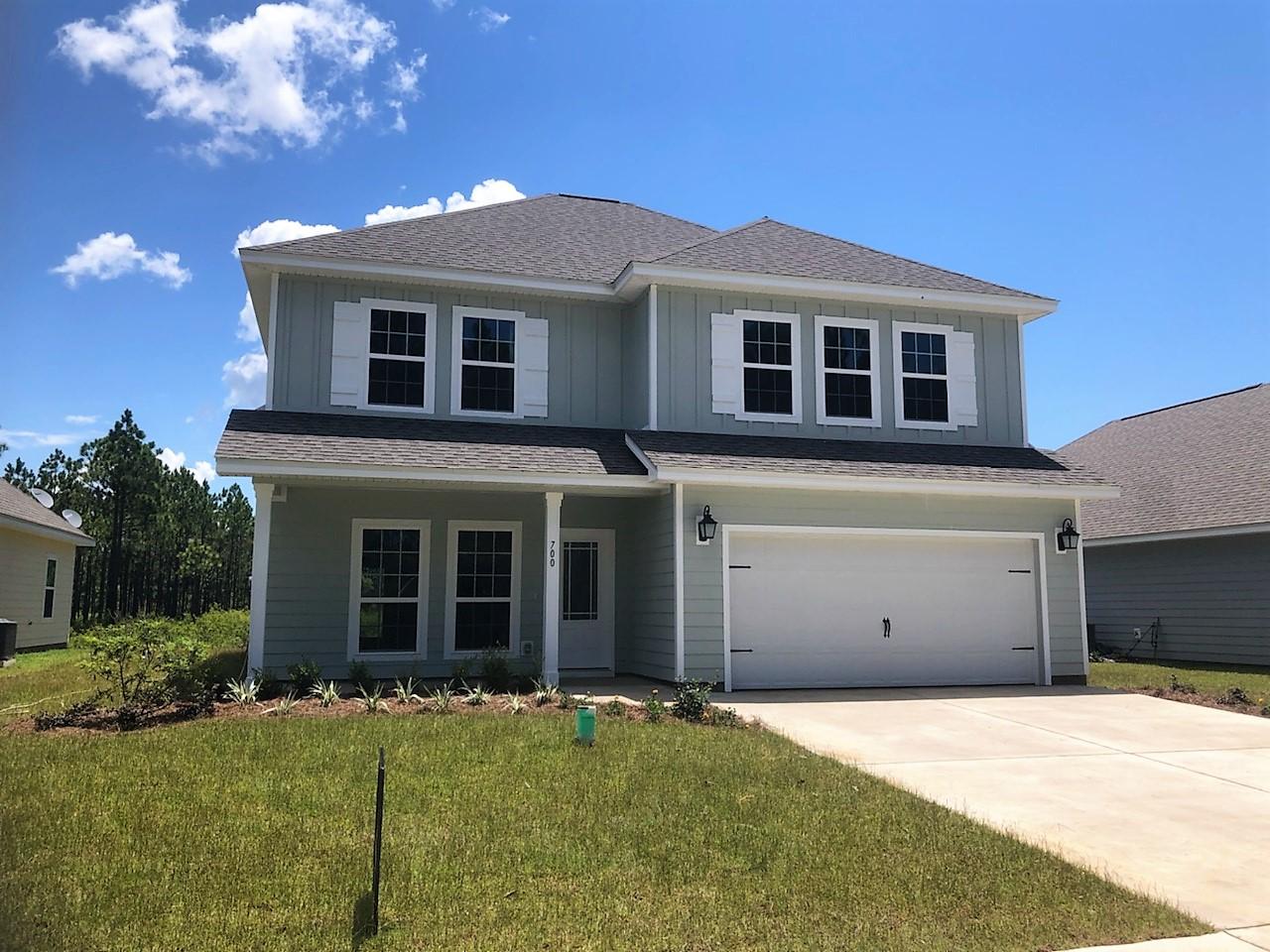 MOVE IN READY NEW CONSTRUCTION home! Seller offering $7,500 closing cost incentive with preferred lender. Bike to the Bay and walk to the community pool. Eagle Bay Landing is a waterfront community in the heart of Santa Rosa Beach, minutes from Grand Boulevard, Sacred Heart Hospital, local dining and shopping. Just outside the 30-A corridor, this quaint community of only 56 homes is easy to access yet surrounded by the natural beauty that is South Walton. Sought after craftsman style home with master bedroom on main level, cute covered front porch and private back yard backing up to wooded conservation with a great back yard. This home is spacious and well thought out with large BONUS room great for play room or entertainment area. Don't miss out on the convenience of new construction!