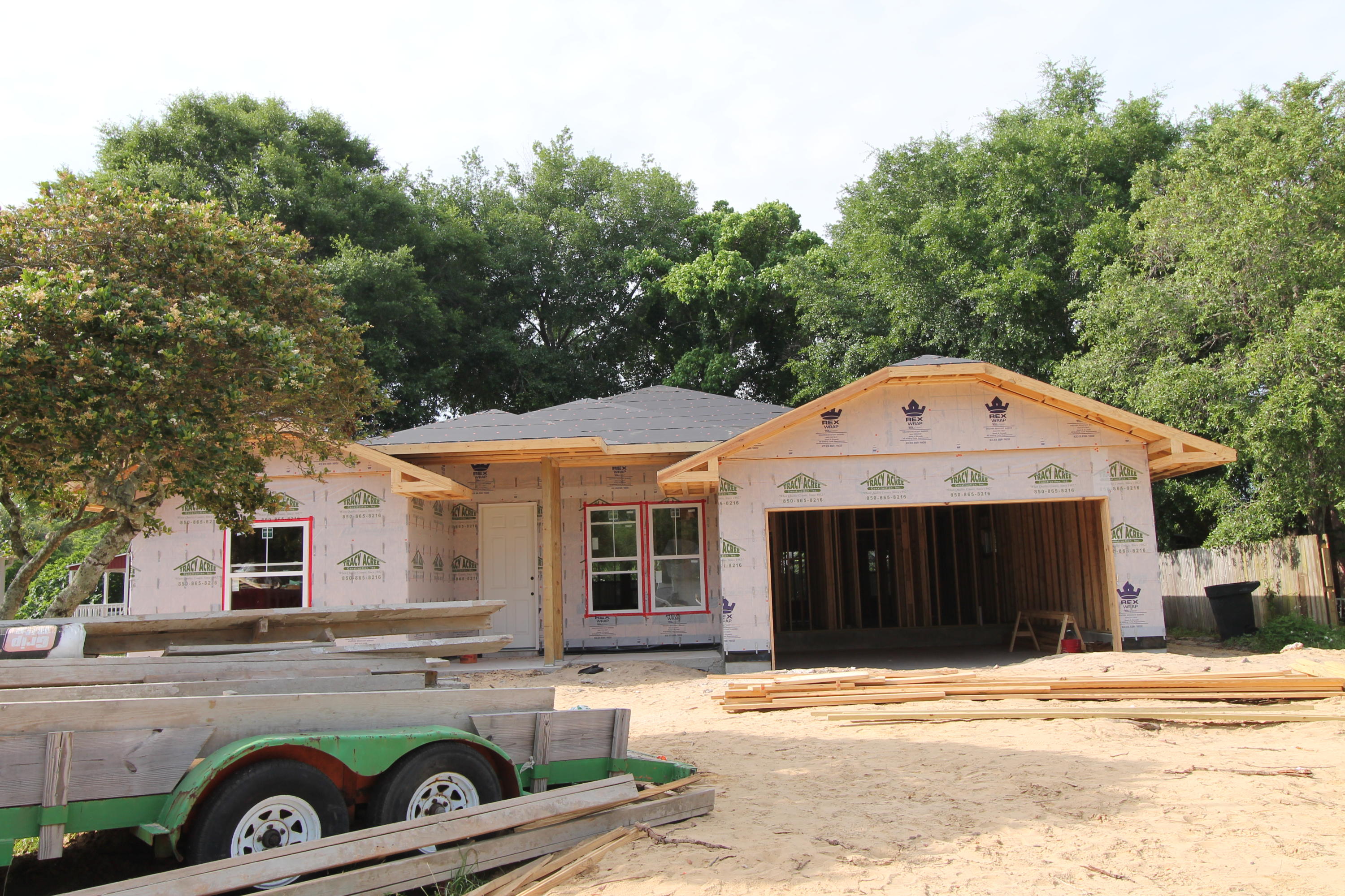 Awesome new floor plan by multiple award winning builder! This 4/3 custom brick home has super curb appeal, and is being constructed on large lot. There are 10 Ft. Ceilings w/ impressive crown molding, will have tile flooring throughout the main living and wet areas, and 5 1/4'' baseboard throughout. As you enter the home, through the covered front porch, the formal dining room is on your right. As you continue down the hallway, you will then enter the chef's delight kitchen which will boast custom maple cabinetry, granite countertops, 2 large pantry's, and stainless appliances (including an oversized commercial grade frig./freezer). Please view photos for appliance info This plan is a split bedroom, where bedrooms 1 - 3, and baths 1 and 2, are located at the right of the home. The master suite is in the rear of the home, is very roomy, has 2 large walk - in closets, a custom tiled walk - in shower with class enclosure, a whirlpool garden tub, a double vanity and a linen closet. The laundry room is conveniently located at the rear of the kitchen. The greatroom is located at the rear of the kitchen, and opens to a covered porch, which is perfect for entertaining. The yard will be beautifully landscaped, have a privacy fence, and comes complete w/ a well, sprinkler system and timer. Insurance will be very reasonable, as home is built to today's code. Home has a Taexx ''in the wall'' pest control system, that is serviced from the exterior of the home, for owner's convenience. Completion is expected in late July.