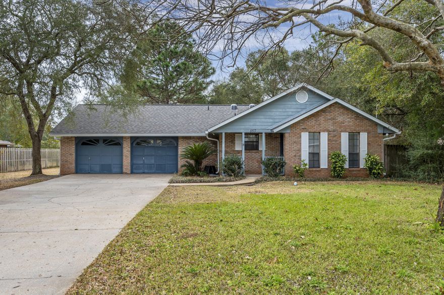 Are you dreaming of a large yard?  1/2 acre property with a spacious brick home ready to move in! Open floor-plan kitchen with newer appliances, granite counters, and tile floors.  Fall in love with the separate dining area, and bright living room.  No carpet, home has laminate and tile throughout.  Plenty of privacy, and located at the end of a cul-de-sac in the heart of Navarre. ROOF 2021