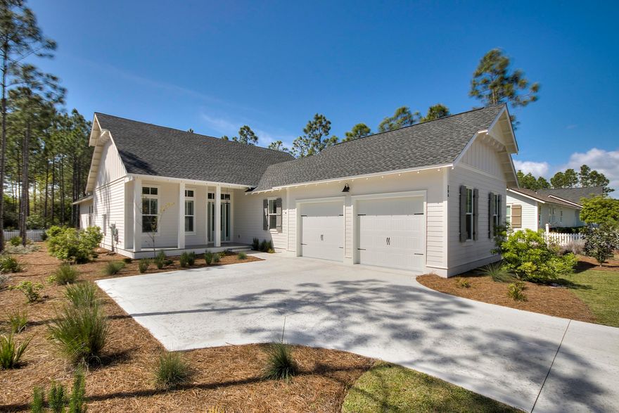 Single Floor Home with Quality Workmanship and Thoughtful DesignThis stunning property is situated on a premium homesite in WaterSound Origins backing up to a Crescent Park and providing ample privacy to its owner and guests.The exterior is as bright, white and clean as the interior, and the sides and back of the property are framed with a classic white picket fence. Architectural style embraces New England and nautical with very attractive curb appeal. The open floor plan flows out French doors to a generous screened porch. A white interior contrasts comfortably with hardwood floors throughout, gas fireplace stone surround, a sliding barn-style door for dining room storage and thoughtfully-chosen light fixtures. The 2-car garage and outdoor shower add to convenience.