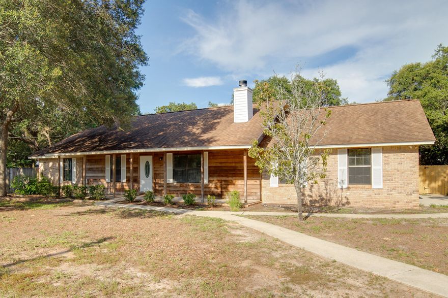 Beautiful Home situated on a large corner lot with side-entry garage...great room with handsome stone fireplace from floor to ceiling...updated kitchen opens to the eat-in dining area with tiled floors and sliders to the back patio...access from the master bedroom to the oversized privacy fenced yard...truly a must see! Thank you for viewing