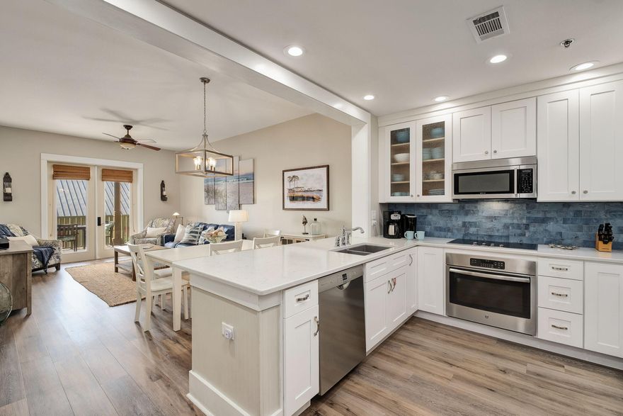Discover Your Dream Coastal Retreat at Redfish Village! with New Bonus Private Bunk room. Welcome to your newly renovated beach condo, a perfect blend of luxury and relaxation, nestled in the heart of beautiful Blue Mountain! This meticulously designed condo boasts a brand new private built-in bonus bunk room, making it ideal for families or vacation rental- 3 bedroom.Step inside to find a stunning renovated kitchen that will inspire your inner chef. Featuring elegant quartz countertops, a stylish designer backsplash, and top-of-the-line stainless-steel Jenn Air and Viking appliances, this kitchen is truly a culinary haven, all wrapped in a delightful beachy color scheme.Luxury vinyl flooring flows seamlessly through the main living areas, enhancing the spacious and invitin atmosphere.  Tastefully furnished with upscale decor, this condo is not just a home; it's an experience waiting to happen.
Key Features:
Hear the waves from your balcony only 1 block to the beach front!
"	2 Bedrooms & additional private Bonus Bunk Room: Ample space for family and guests.
"	Covered Parking: Convenience at your doorstep.
"	In-Unit Washer & Dryer: The ultimate in vacation ease.
"	Impressive Rental Income Potential: Perfect for investors!
But beauty extends beyond your doorstep! Redfish Village offers exclusive access to an approximately ?? acre gated private beachfront where sun-soaked days and breathtaking sunsets await. Season beach chair and umbrella service is available. Bonus: Redfish provides a private seasonal tram service to whisk you away to the beach, ensuring your days are filled with sun, sand, and surf.

In addition, embrace the outdoors with scenic trails that wind through nature and lead to a picturesque wooden boardwalk down to the Redfish Lake.  Enjoy an afternoon poolside at the lakefront community pool, gather with friends in the community room, or fire up the grill at the poolside grilling station. And for families, there's a delightful playground for the little ones to enjoy! Walking distance to great local restaurants like Red Fish Taco, Cowgirl Kitchen, and the Blue Mountain Creamery.
Don't miss out on this incredible opportunity to own a piece of paradise. This condo is more than a home, it's your sanctuary on the white sands and emerald waters of 30A. 