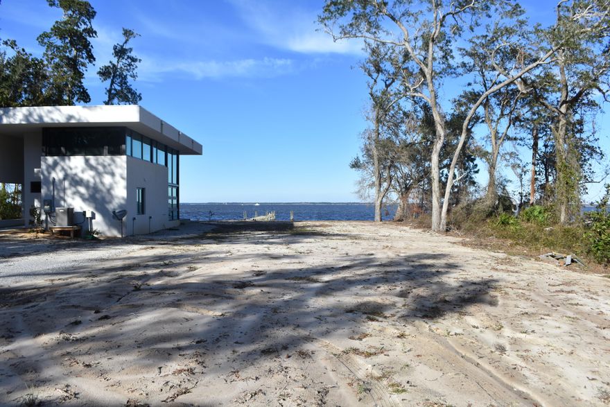 Large, cleared Bay front lot in Beautiful Point Washington offering 51'+ on the Choctawhatchee Bay! Watch the sunrise over the bay or sunset over the Clyde B. Wells bridge. Build your Custom Dream home to capture every view corridor from this .25 +/- acre waterfront lot. Lot has been completely cleared, soil test complete and survey on file. All you need is a plan for your dream home and start living an amazing waterfront lifestyle. Point Washington is quiet yet close to the area beaches, eateries and shopping and Local Grayton Beach. This lot is priced to sell and won't last long.