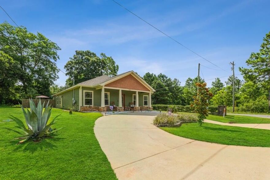OPEN HOUSE Friday JUNE 24TH 2-4 PM Beautiful POOL HOME and Private Retreat!!! The backyard is beautifully landscaped around a stunning saltwater pool...you will truly feel as if you've escaped to your own paradise. The 5 BD/2.5 BA Craftsman style home is located on a large corner lot complete w/ wood-look tile and plantation shutters throughout! The home features an open floor plan and great layout. Kitchen boasts lots of cabinets, breakfast bar, center island and granite countertops. Master suite is spacious and features dual vanities, walk-in closet and shower. All guest bedrooms are a nice size. The home fronts two streets and features a side load garage. Perfect home for entertaining! Covered rear porch, fenced back yard and coordinating yard building! HVAC was replaced Feb 2022