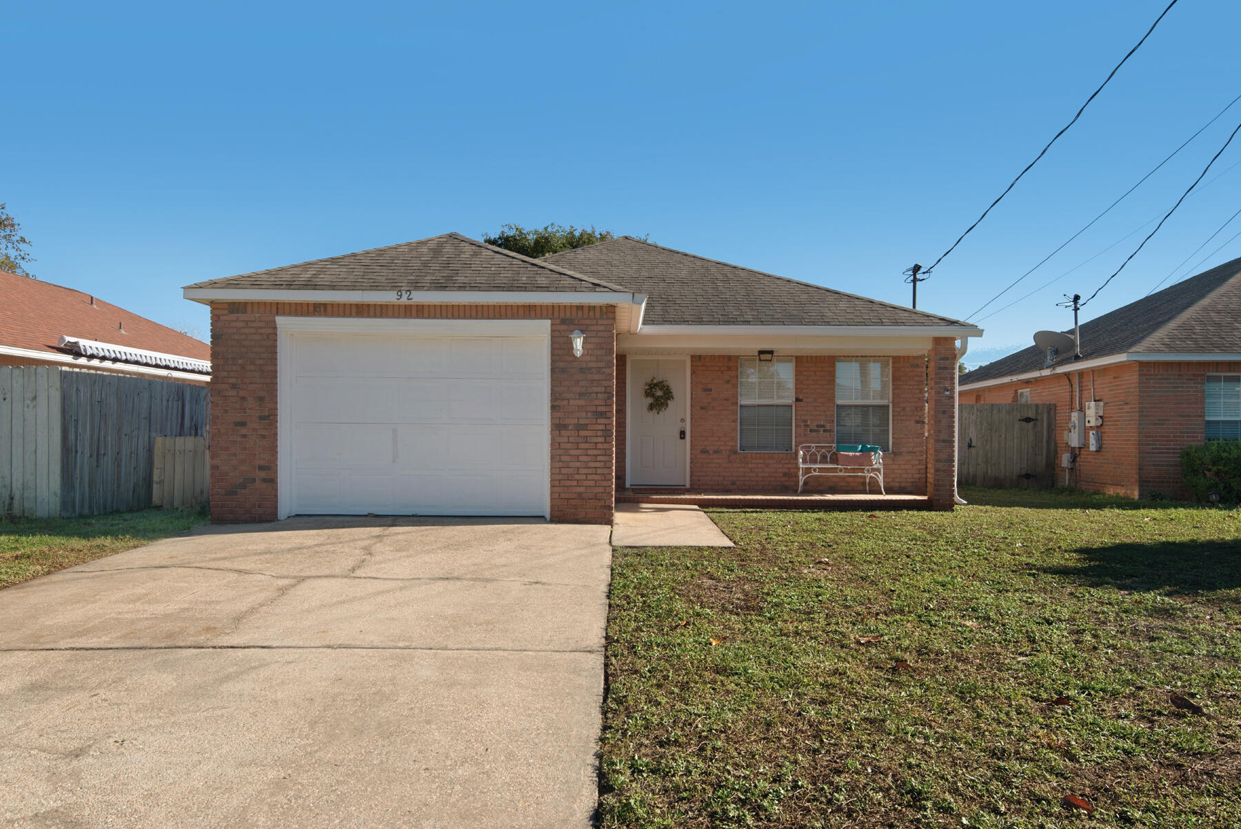 Welcome to the loveliest, little piece of paradise in the heart of Destin, FL with no HOA! This recently refreshed 2 bedroom, 2 bathroom Florida cottage is the perfect place to call your own. New paint, new carpet, and recently pressure washed. As you enter to the right is a light and bright front room could be used as an office or second living space. The kitchen is spacious with all the cabinet space you'll need, black appliances and breakfast bar to sit 4. The master bedroom is situated at the back of the house, has a walk-in closet and ceiling fan. An additional bedroom. Head out back to a cute recently installed wood deck with a fully fenced backyard. One-car garage with recently paint floor. Laundry located in the garage. This cozy home is located conveniently to all things Destin o on a quite dead end street. Short drive to shops, entertainment, beaches, parks and boat ramp. Whether you are purchasing as a primary residence or longterm rental, you will appreciate this well-kept home. 
