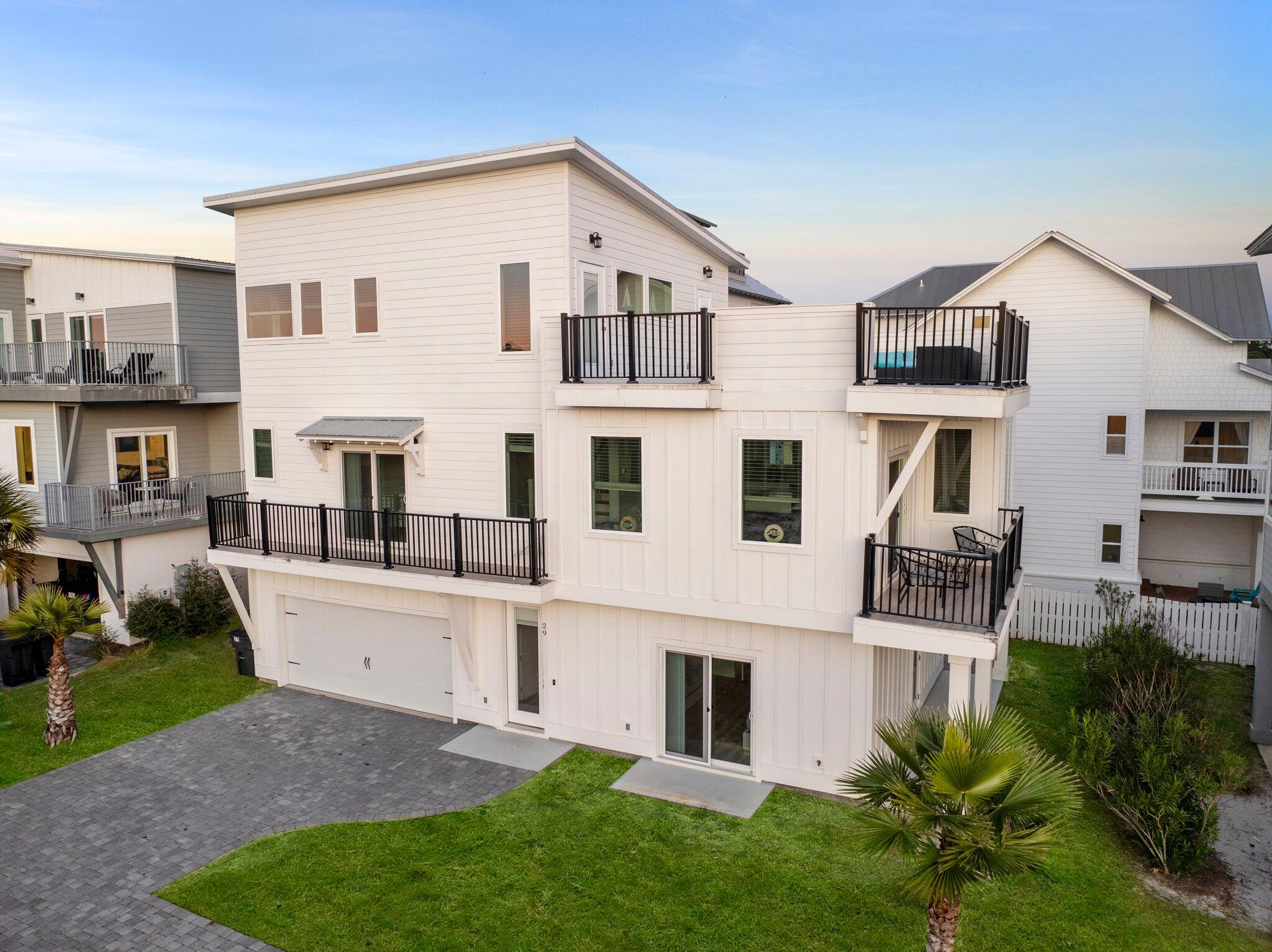Discover coastal living at its finest in this exquisite 4-bed, 3.5-bath home nestled in the heart of Inlet Beach, Florida. Ideal for both savvy investors seeking a lucrative short-term rental opportunity (OVER $150,000 annually) and discerning individuals seeking a perfect personal residence. Boasting contemporary design and panoramic scenic views, this residence offers a spacious interior, gourmet kitchen, and two private master suites. Enjoy the serenity of coastal breezes from the expansive rooftop deck or take a short stroll to pristine beaches. With upscale finishes and proximity to local 30A attractions, this home embodies luxury coastal living in one of Florida's most sought-after communities.