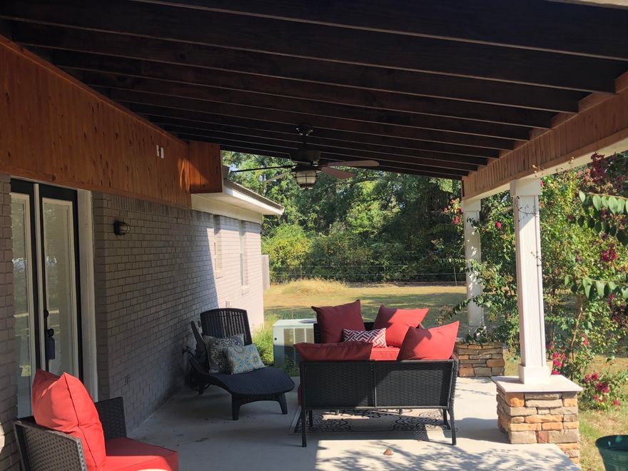 Baker living on one acre with beautiful oaks and magnolias! All brick metal roof renovated! Open living area with a split bedroom design. Enjoy the huge master suite with a cultured marble Jacuzzi tub and a huge master closet! Come home to Dairy Rd today!