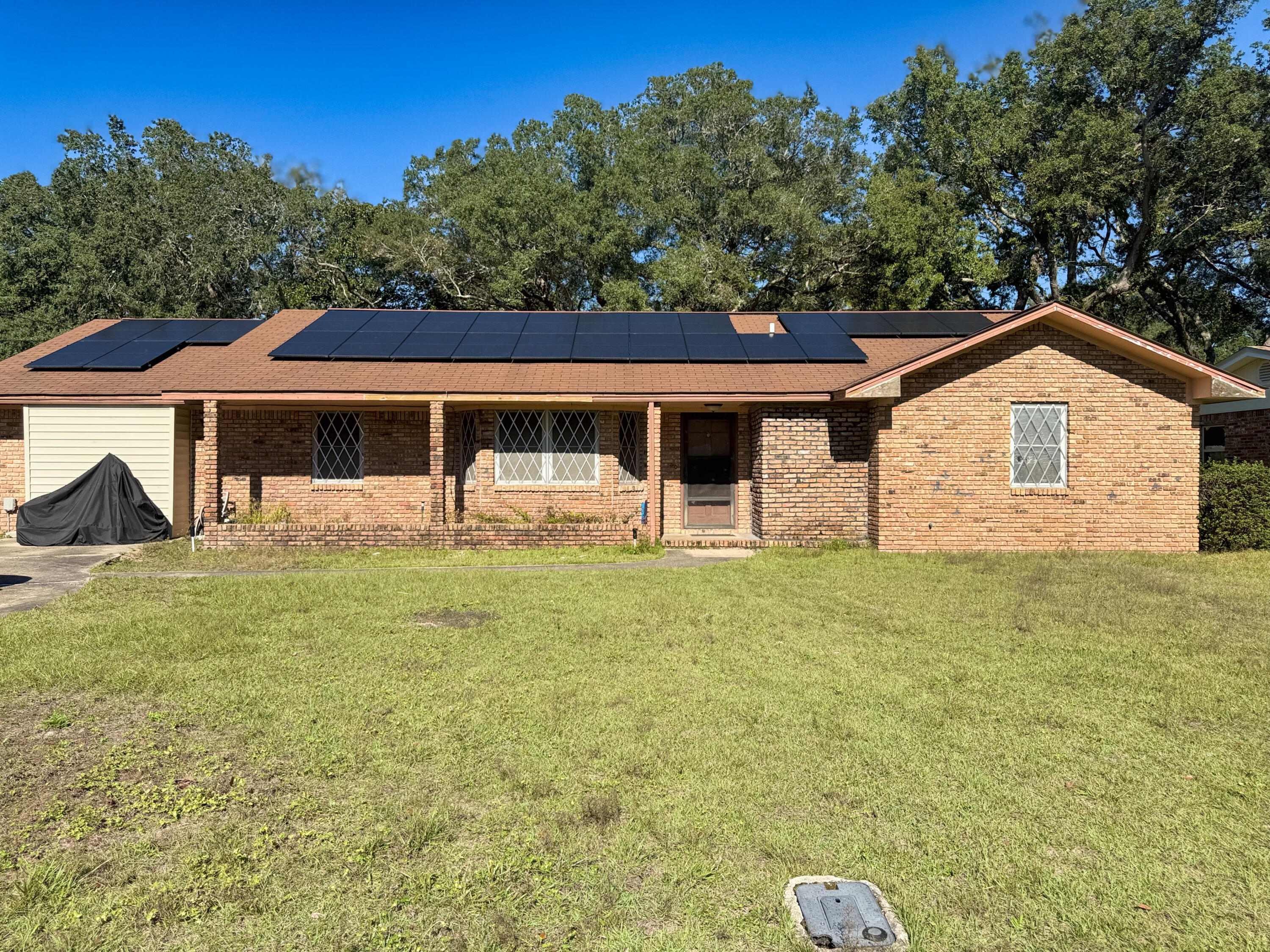 Are you ready to bring your vision to life? Welcome to 1411 28th St., a home brimming with potential, nestled in the vibrant heart of Niceville. This 4-bedroom, 2-bathroom property, complete with a dedicated office, offers plenty of space for your personal touch--all on a manageable 1/4-acre lot.Enjoy the benefits of solar panels that will be fully paid off at closing, a one-year-old water heater, and a well-maintained HVAC system just six years old. Situated in a prime location, you'll be minutes away from exceptional shopping, dining, and top-rated schools.Don't miss this opportunity to transform this house into the home of your dreams!