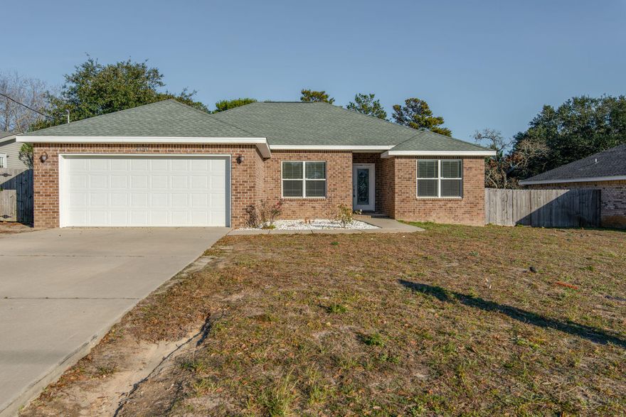 RELAX AROUND YOUR PRIVATE SALT WATER POOL THIS SUMMER. All Brick, 4 bedroom / 2 bath split floor plan with an array of special features. Lace textured ceiling, accented with crown molding in the living areas. Porceline tile in the wet areas and Brazilan wood flooring in great room and master bedroom. Remaining bedrooms have carpet. There is ample cabinet space with granite counter tops, and stainless steel appliances. . Location is close to shopping, the beach and only 6 miles West of Hurlburt Field AFB front gate.