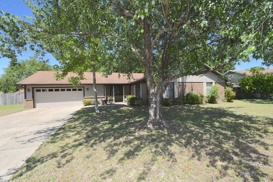 Contingency Contract Pending w/72 Hour Kick Out. RENOVATED, Chef's Dream Kitchen w/outdoor entertaining and relaxing, shady Back Yard. Plenty of privacy and a Screened Porch! Located in Summit Park and w/in walking distance to Bay Bluffs Park w/ a view of Pensacola Bay. Move in to your 3 Bedroom 2 Bath, 2,000+ sq.ft. home w/energy efficient upgrades (NEST thermostat, Tankless Gas Water Heater, appliances and insulated covered patio). Chef's Kitchen features: Gas Range, Electric Stove, Kitchen Bar, Island w/a 2nd sink and Ice Maker. Island can seat FIVE! NEW Laminate wood flooring throughout w/ceramic tile in Den, Kitchen, and dining area. Den features a cathedral, beamed ceiling anchored with a wood burning fireplace and access to your Covered patio and Screened porch.