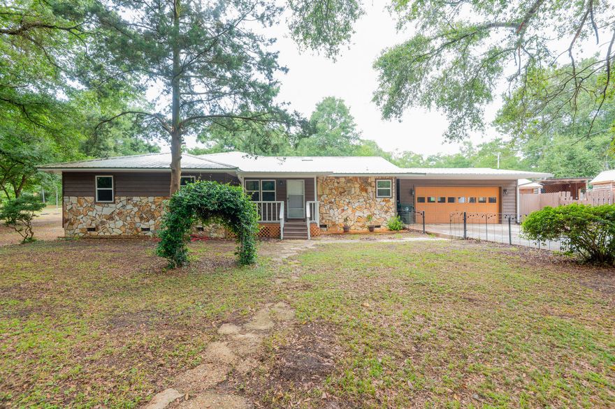 This is a beautifully renovated home within the city limits of DeFuniak Springs. It features a spacious, open floor plan on a generously sized lot. The house sits on a paved, dead-end road, offering lots of privacy. Enjoy an open kitchen with all new appliances, stone fireplace, new windows, and large rooms throughout. This large house would be a great new home for your family!