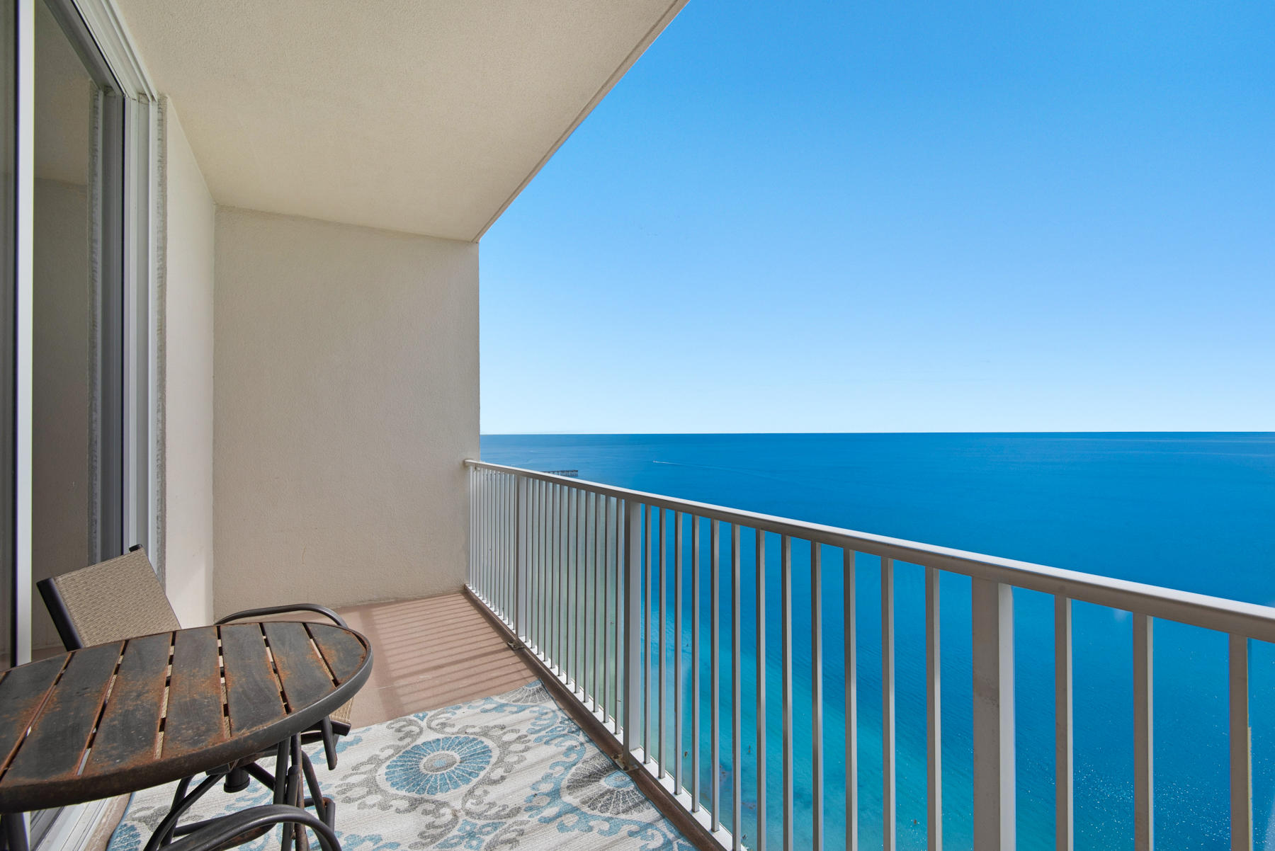EASY SHOW! Views that go on forever. Never rented, freshly painted This unit is being sold UNFURNISHED so it's a clean slate to make your own. New Plantation Shutters, all new window treatments, all new appliances, new hot water heater, new kitchen back splash all new bathroom hardware and, new a/c thermostat, a/c recently serviced, new tv's, All new door hardware, LED light fixtures, and new ceiling fans.. Tidewater Beach is a renters paradise. It has 3 pools, one indoor, 2 outdoor pools, grills, theater, conference center, fitness room that has Gulf side views with spa area.Location is outstanding close to the Bay County Beaches airport, Pier Park is walking distance and easy drive to 79. Tidewater Beach is a rental machine.