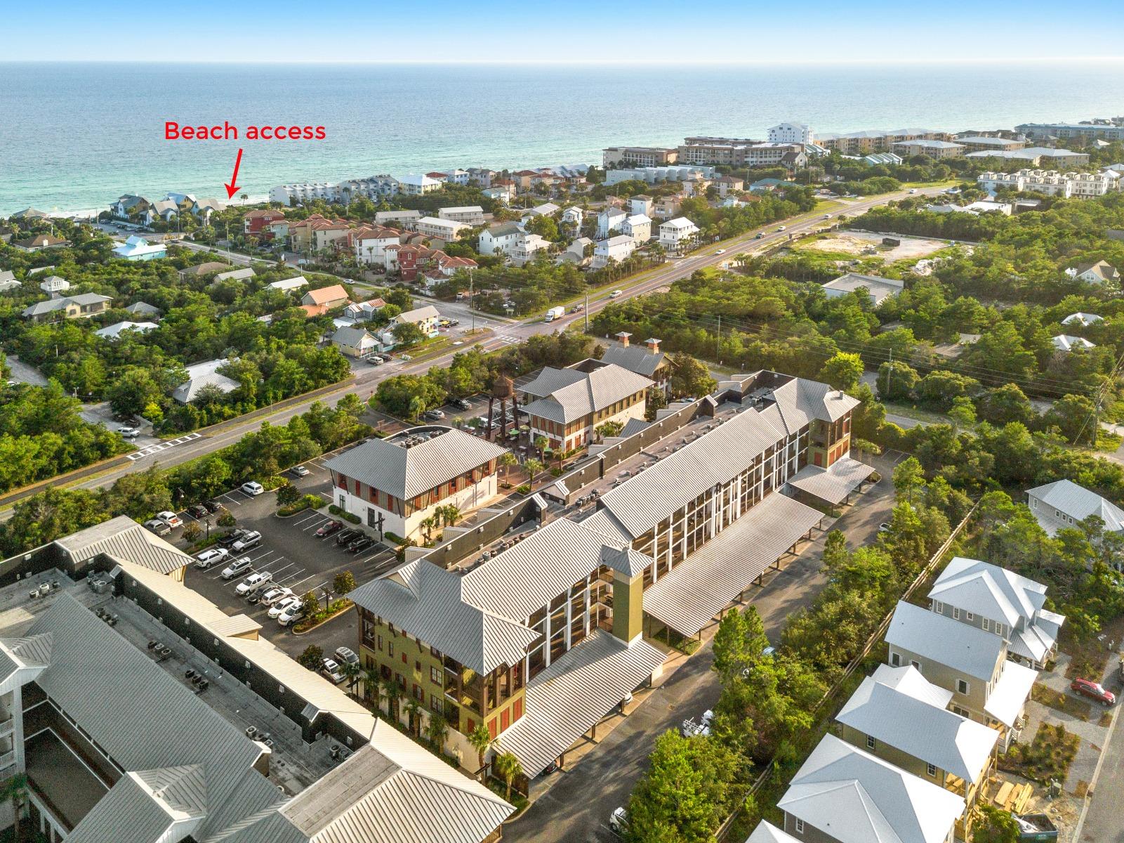 Amazing corner unit located in Redfish Village on Scenic 30A is rental ready and offers the largest floor plan available. This 3 bedroom, 3 bathroom condo plus additional double bunk room is fully furnished. The kitchen, living room and dining room provide an open floorplan perfect for entertaining or family gatherings. The large kitchen has an island and breakfast bar with granite counter tops, stainless appliances and custom cabinets. Hardwood floors run throughout the living areas in this condo. The master bedroom has access to the balcony as does the living area. The master bedroom features a walk in closet as well as a spacious master bathroom including dual vanities, separate tub and shower and tile floors. There are two guest bedrooms with full bathrooms. Four bunk beds are located