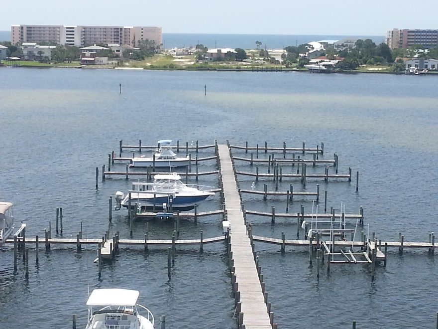 Stunning views of the Sound and the Gulf! This two bedroom, two bathroom unit has new granite, new stainless steel appliances, and new tile flooring throughout the kitchen and living areas. Relax on your balcony and soak in the beautiful views of the water; each member has an available boat slip on the 400 ft dock below. The master bath has a large whirlpool tub and separate shower. This unit shows beautifully and you just can't beat the view! Set up your showing today!