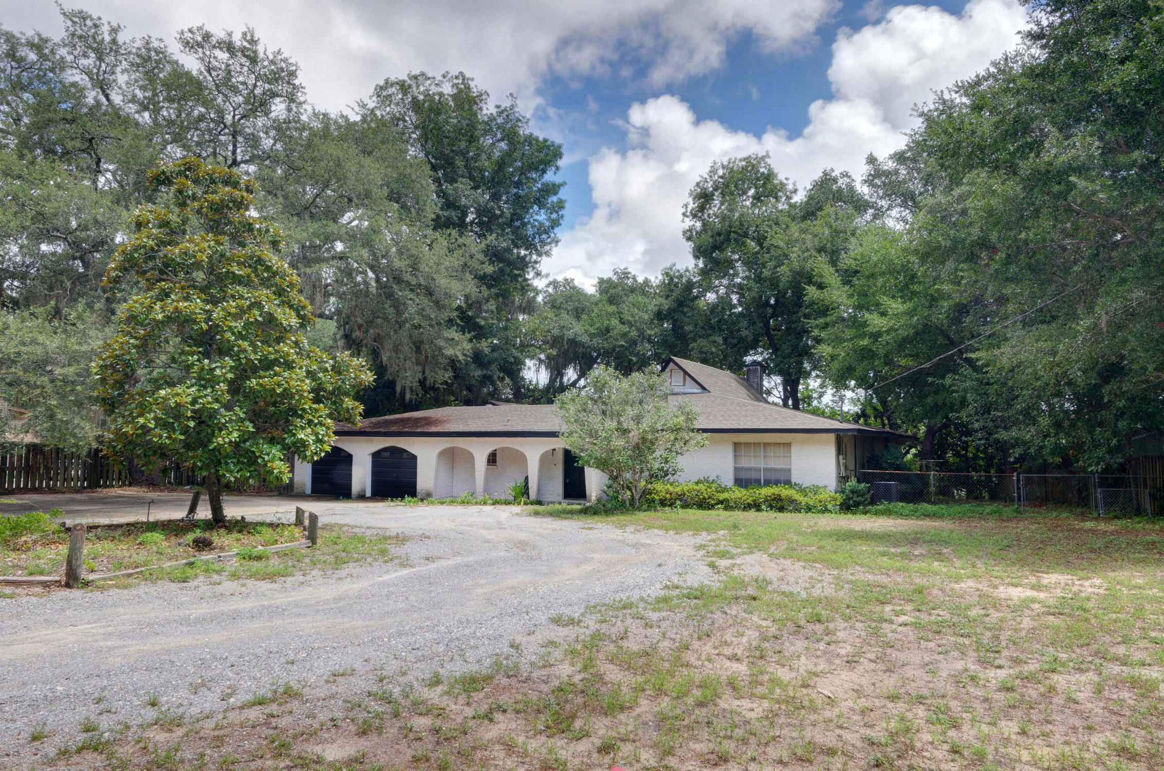 Rare find, Large Concrete Block Home on over 1 acre of land centrally located on Cinco Bayou! Vast living space for a large family with open floor plan and a Florida room to enjoy the views of the bayou. Open deck out back with a Gazebo and stairs to the backyard and boat dock. There are 73 feet of waterfront property and deep water convenient for boat.