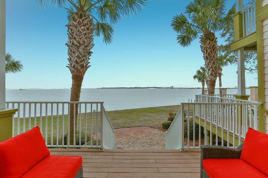 SPRING HAS SPRUNG with an unbelievable Opportunity to live on the Bay with your own semi-private Beach. Enjoy direct access to the Gulf of Mexico, with Shell Island in your immediate sight lines. This GEM has unobstructed views from every level and boasts 4 bedrooms, 4 baths with 3 stories of living space. Private 3rd floor Master Retreat, will not disappoint with immaculate finishes, His & Her closets and impeccable hardwood flooring. All Bedrooms have a private bathroom, are generous in space and have tall ceilings. The Kitchen is complete with Stainless Steel appliances, masterful countertops, ample custom cabinetry and a separate ice maker. The large living and dining area are perfect for meals, hangouts & entertaining and watching the sunset.