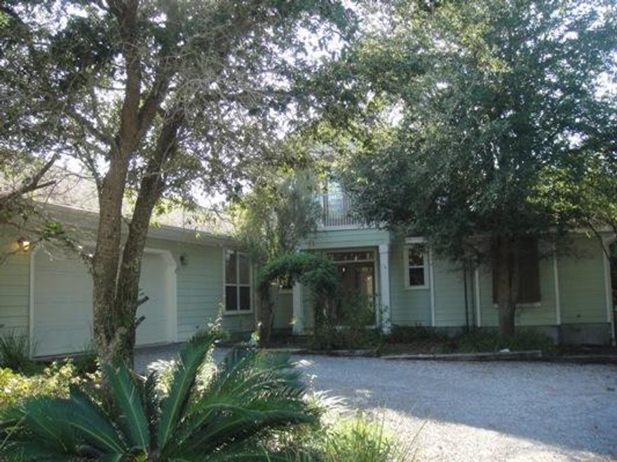 This lovely home in Santa Rosa Beach, Florida features three bedrooms and two and a half baths. The living areas are tiled and set in a spacious, open floor plan. Built-in bookcases, high, beamed ceilings and a gas fireplace are all beautiful extras that add wonderful charm to this home. The master bedroom, which includes walk-in closet, a master bath featuring a garden tub and seperate shower, is located on the first floor with two additional bedrooms upstairs. Each bedroom opens onto spacious decks with a screened porch. You will also enjoy the bonus room, located on the main level. This home is located just moments from the best entertainment and dining in the area and is also a short stroll to the beach. Pets allowed upon owner approval