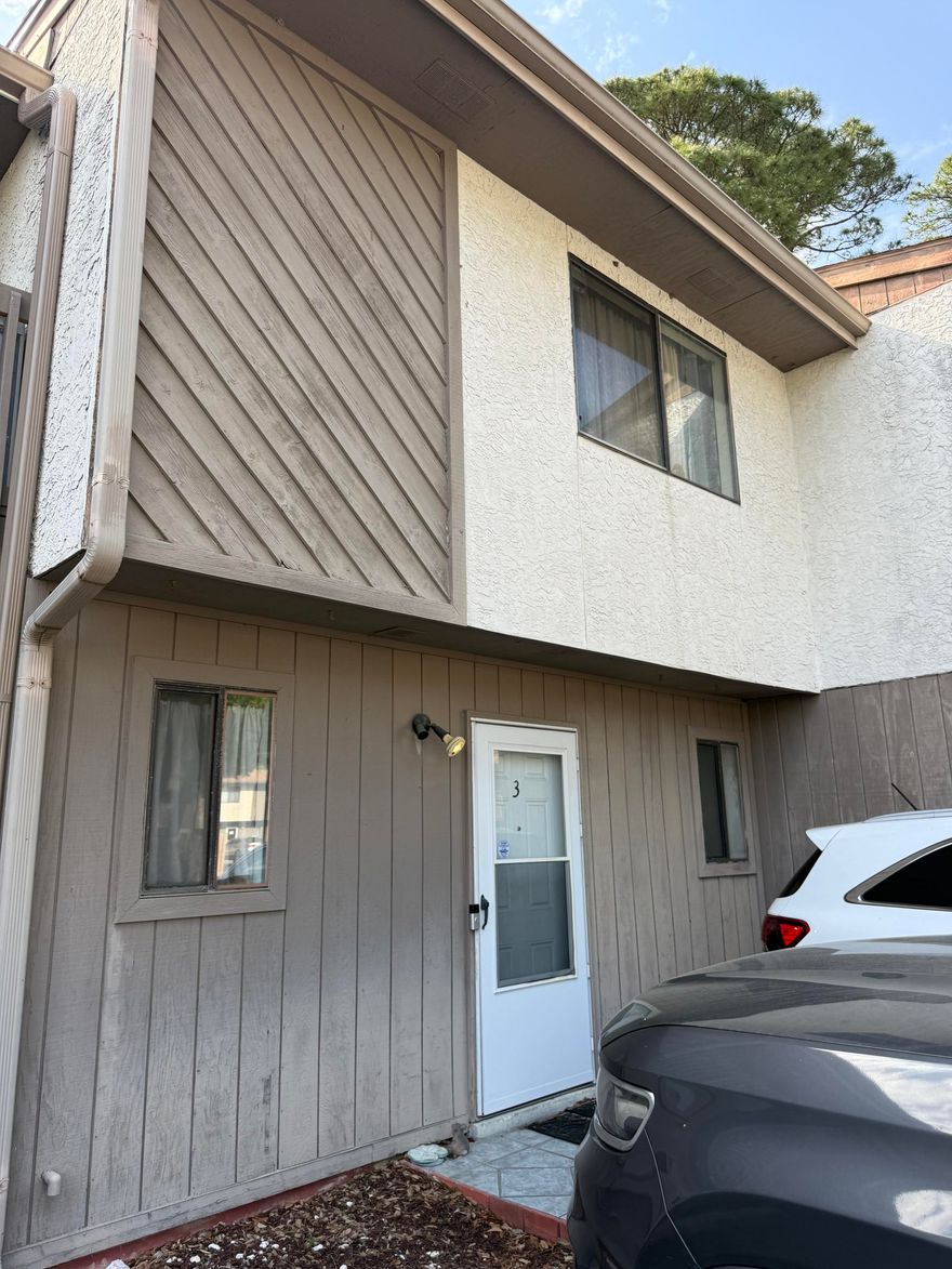 Seller looking for as is sale - Charming Townhome in Prime Location!Located just minutes from downtown and the beautiful beaches of Okaloosa Island, this well-situated townhome offers both convenience and coastal living. The main floor features a kitchen that opens to a spacious living room, perfect for entertaining or relaxing. Step outside to a private fenced backyard with a patio and two storage areas--ideal for outdoor living and extra space.  Upstairs, you'll find a comfortable master. bedroom with its own balcony overlooking the backyard, along with a second bedroom and a full bathroom. Additional highlights include stainless steel appliances and a roof installed in 2017